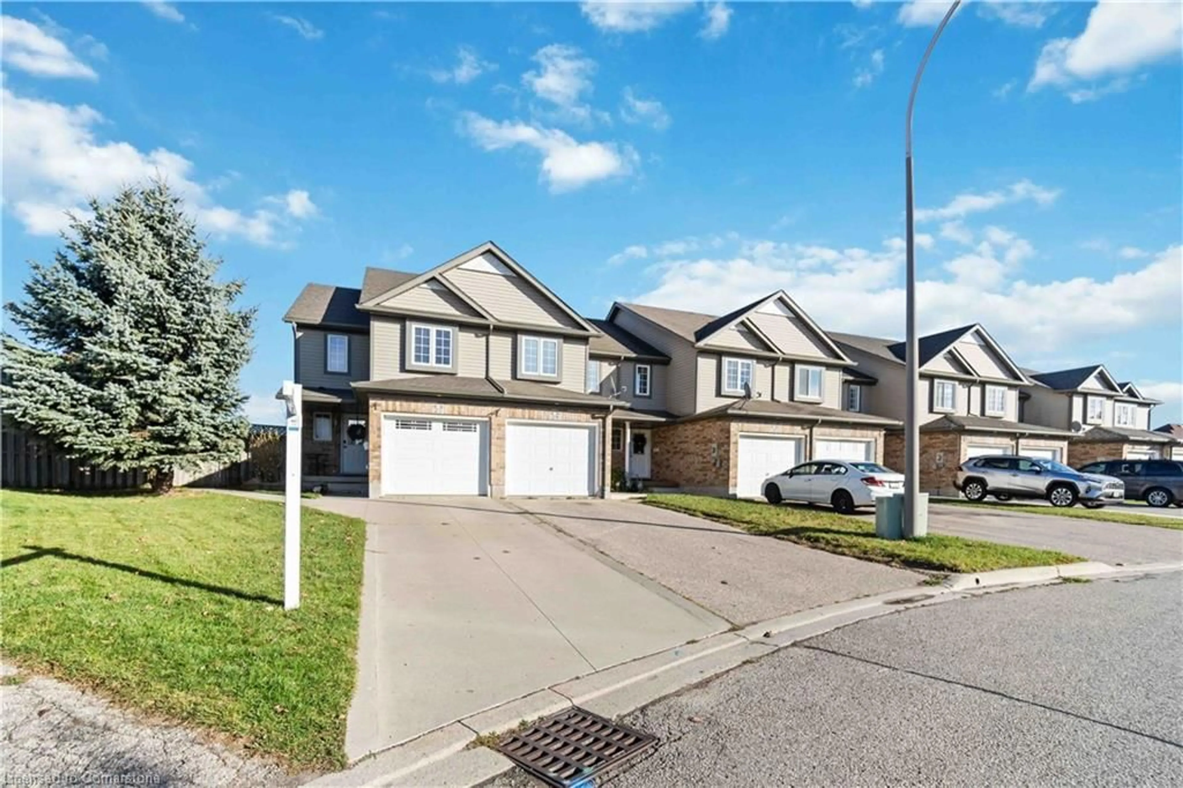 A pic from exterior of the house or condo, the street view for 27 Red Clover Cres, Kitchener Ontario N2E 4G8