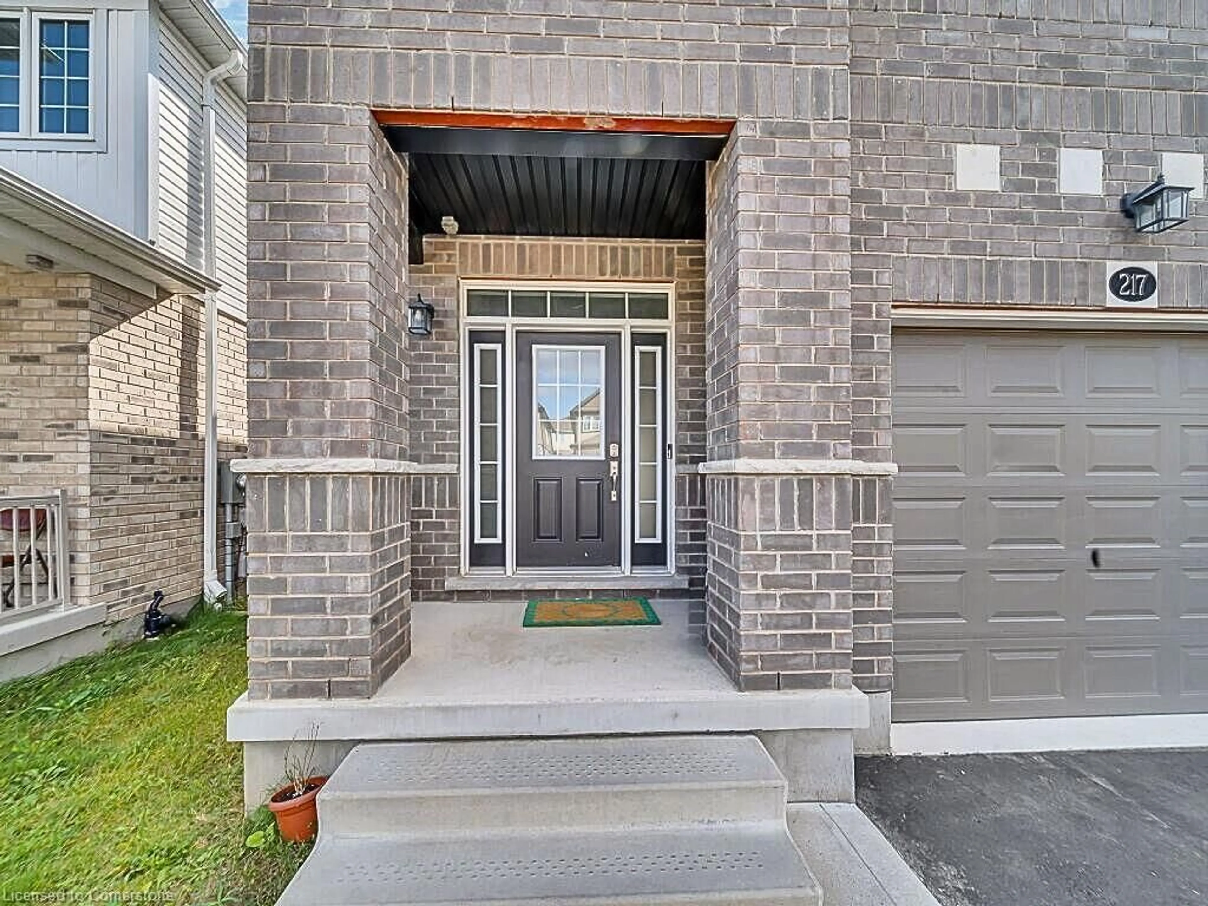 Home with brick exterior material for 217 Sedgewood St, Kitchener Ontario N2P 0H9