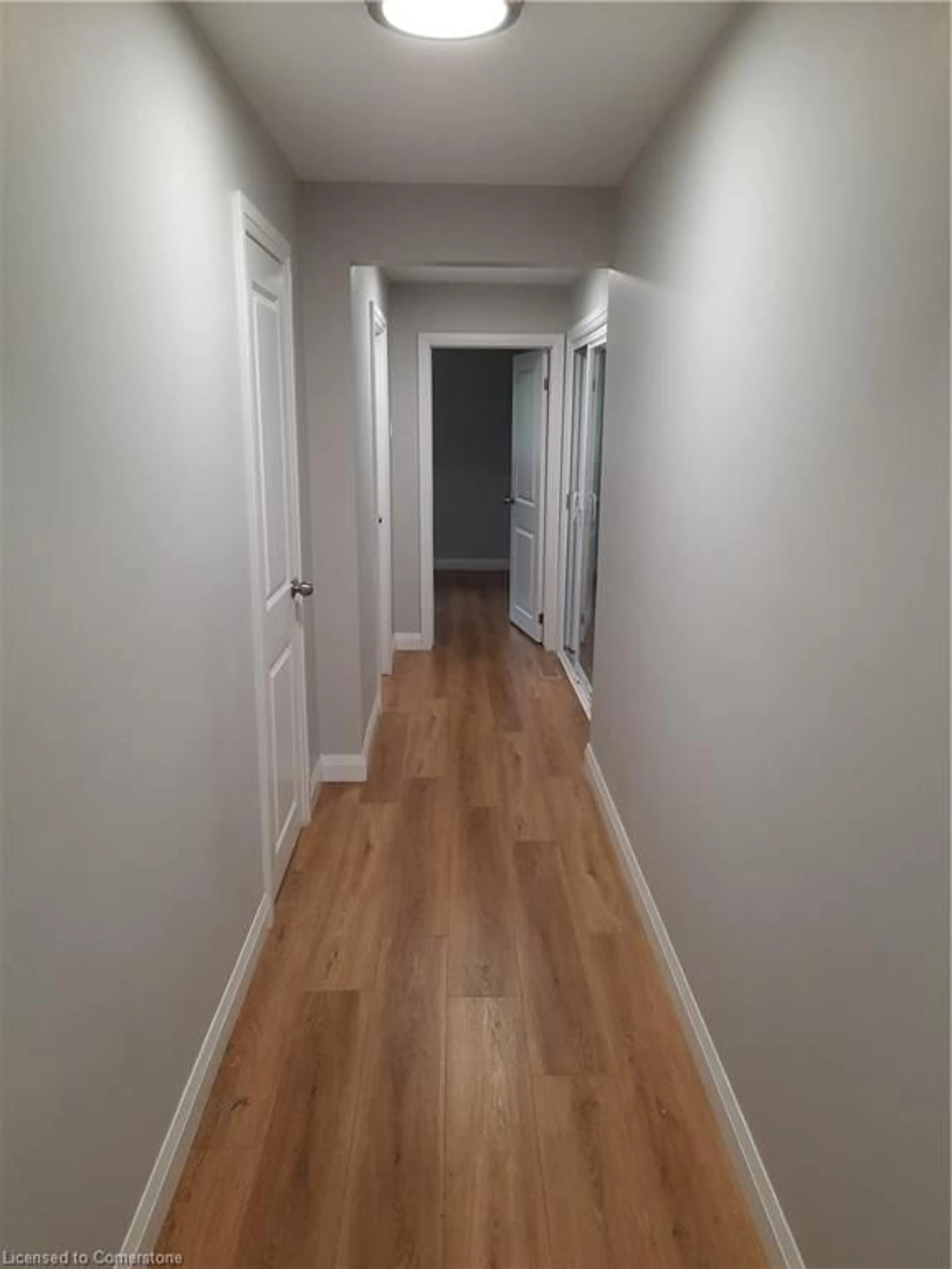 A pic of a room, wood floors for 8 Oxford St, Brantford Ontario N3R 5C6