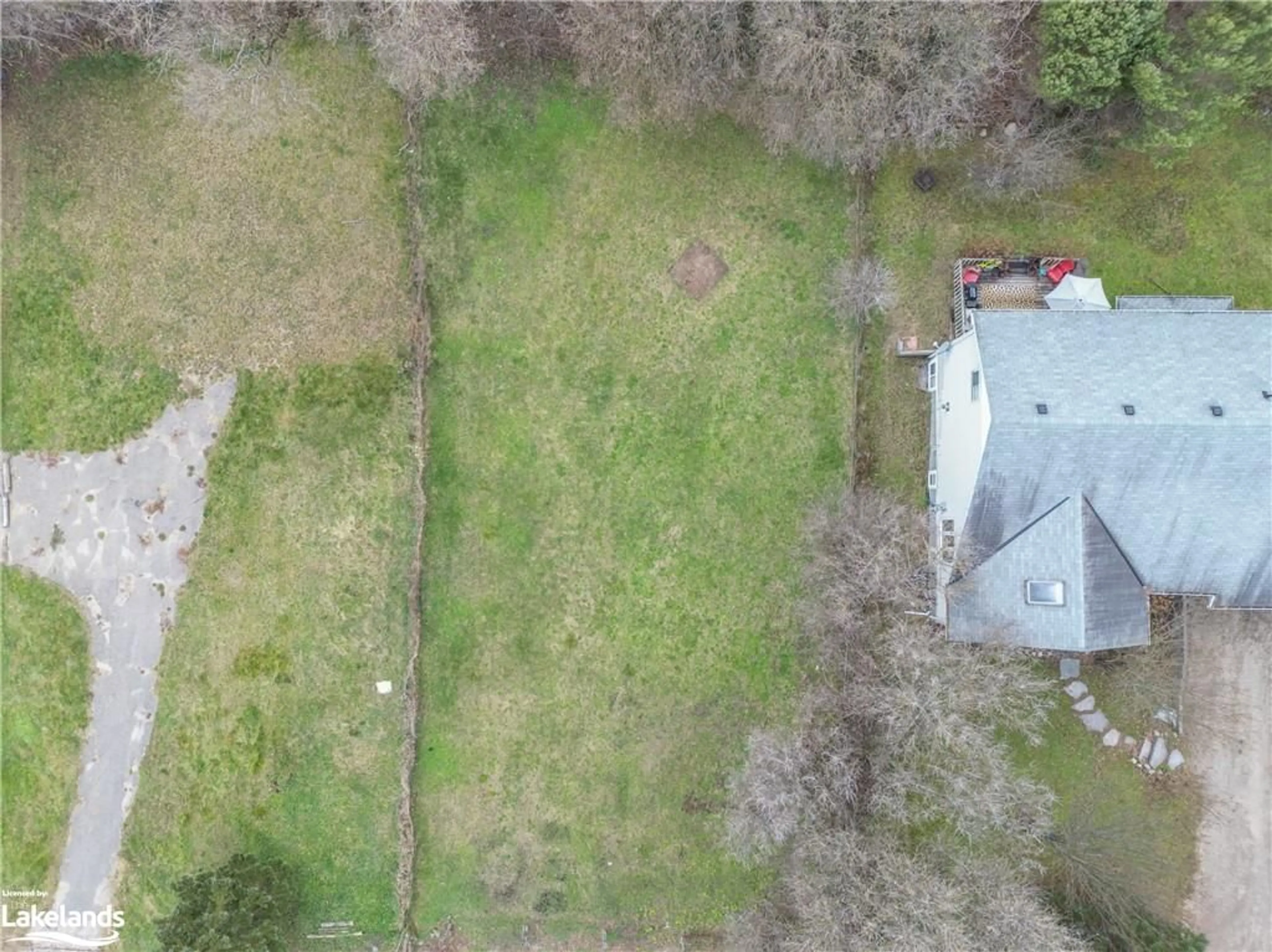 Frontside or backside of a home, the fenced backyard for LOT 4 Elm St, Burk's Falls Ontario P0A 1C0