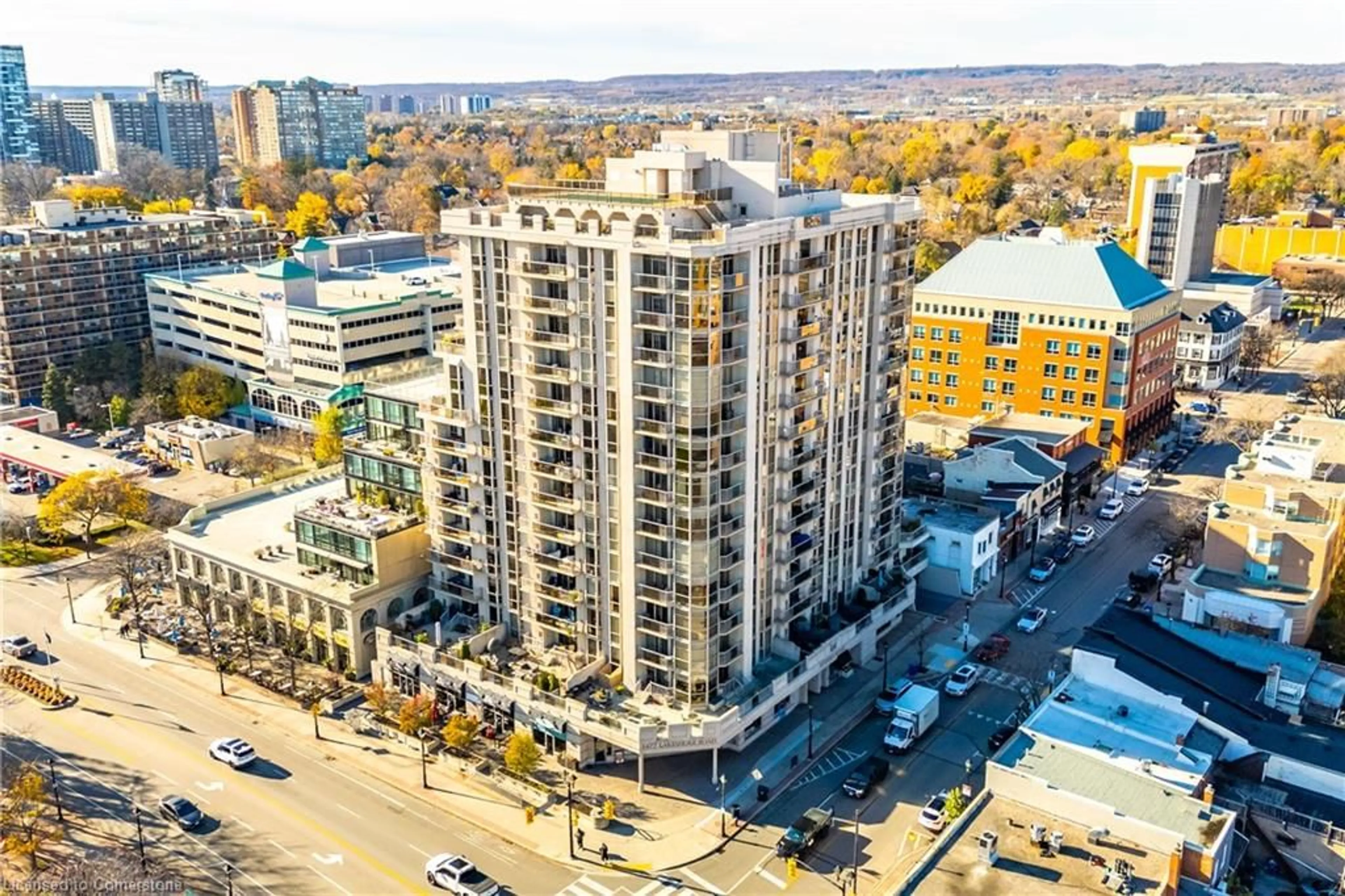 A pic from exterior of the house or condo, the view of city buildings for 1477 Lakeshore Rd #304, Burlington Ontario L7S 1B5