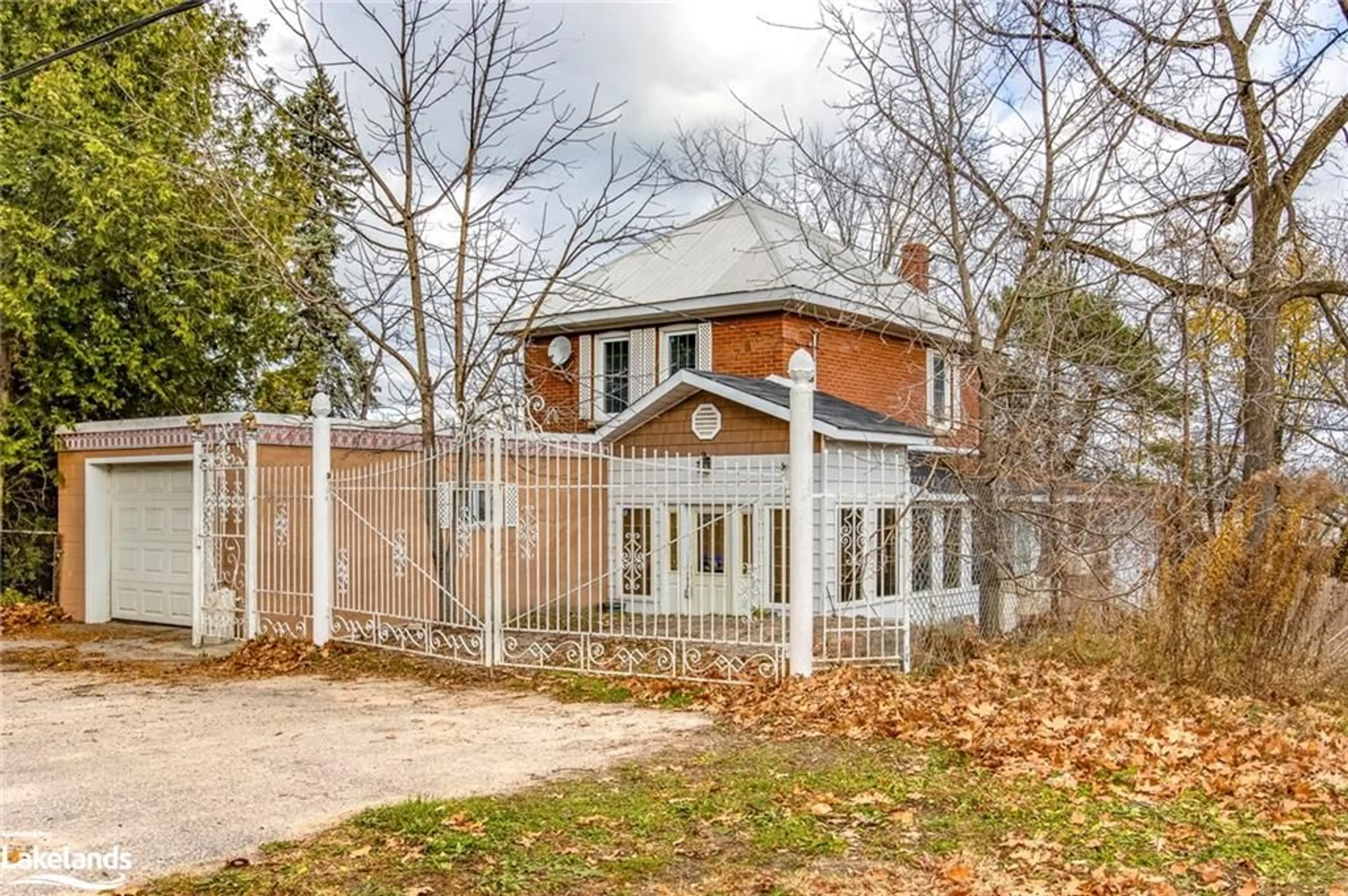 Frontside or backside of a home, the fenced backyard for 787 Fifth Ave, Port McNicoll Ontario L0K 1R0