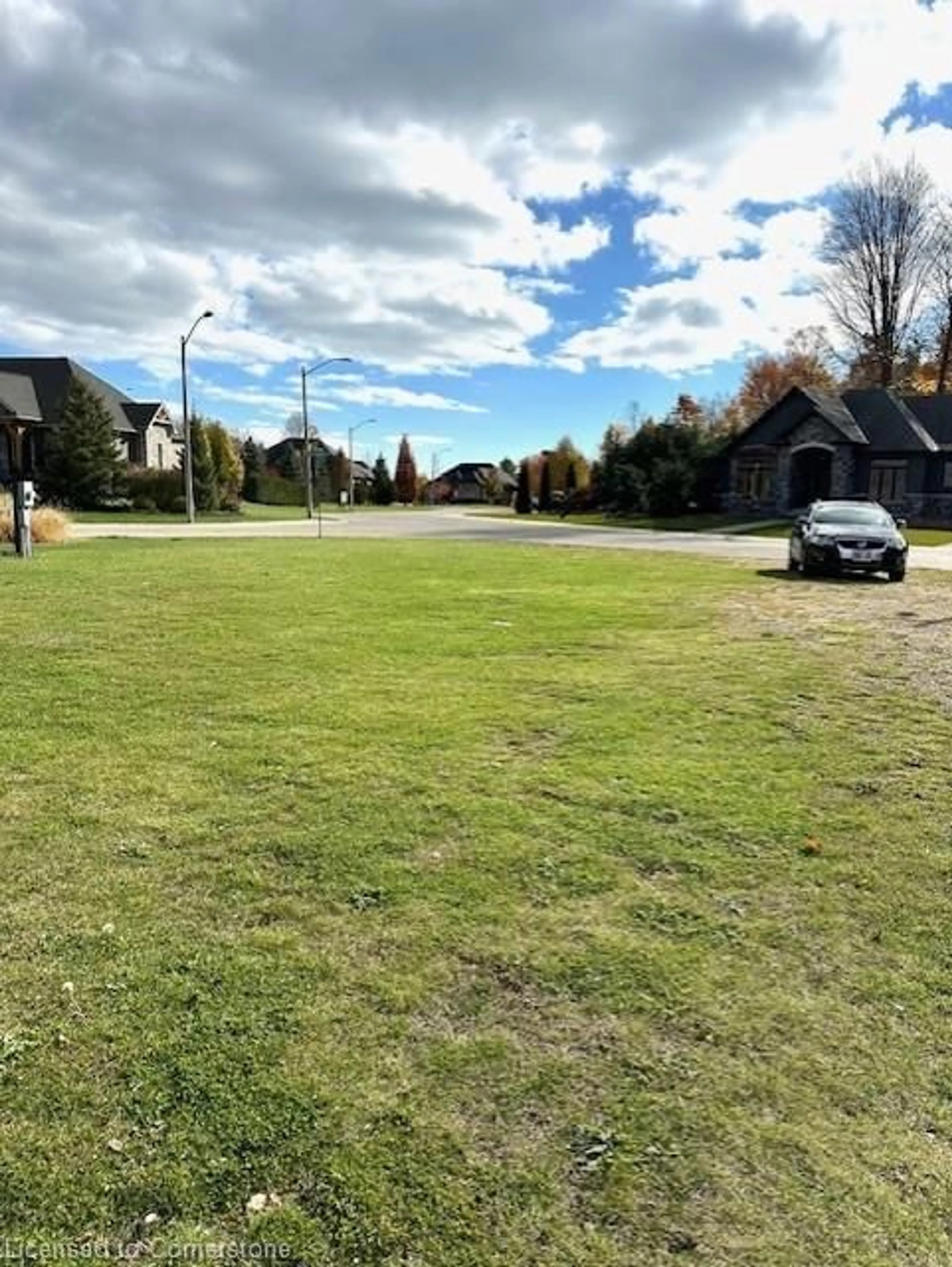 Frontside or backside of a home, the street view for 117 Donjon Blvd, Port Dover Ontario N0A 1N7