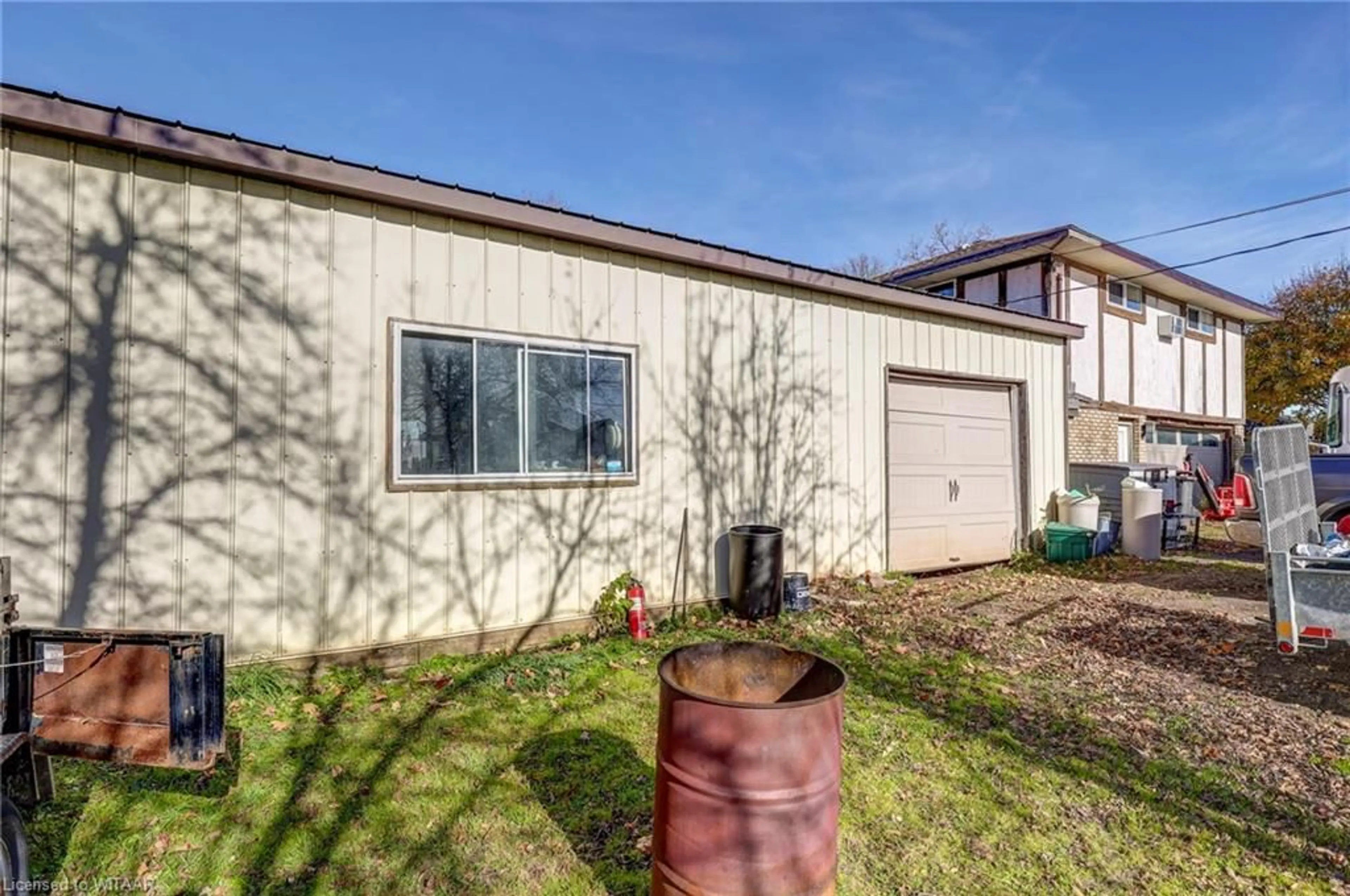 Frontside or backside of a home, the fenced backyard for 11709 Tracey St, Springfield Ontario N0L 2J0