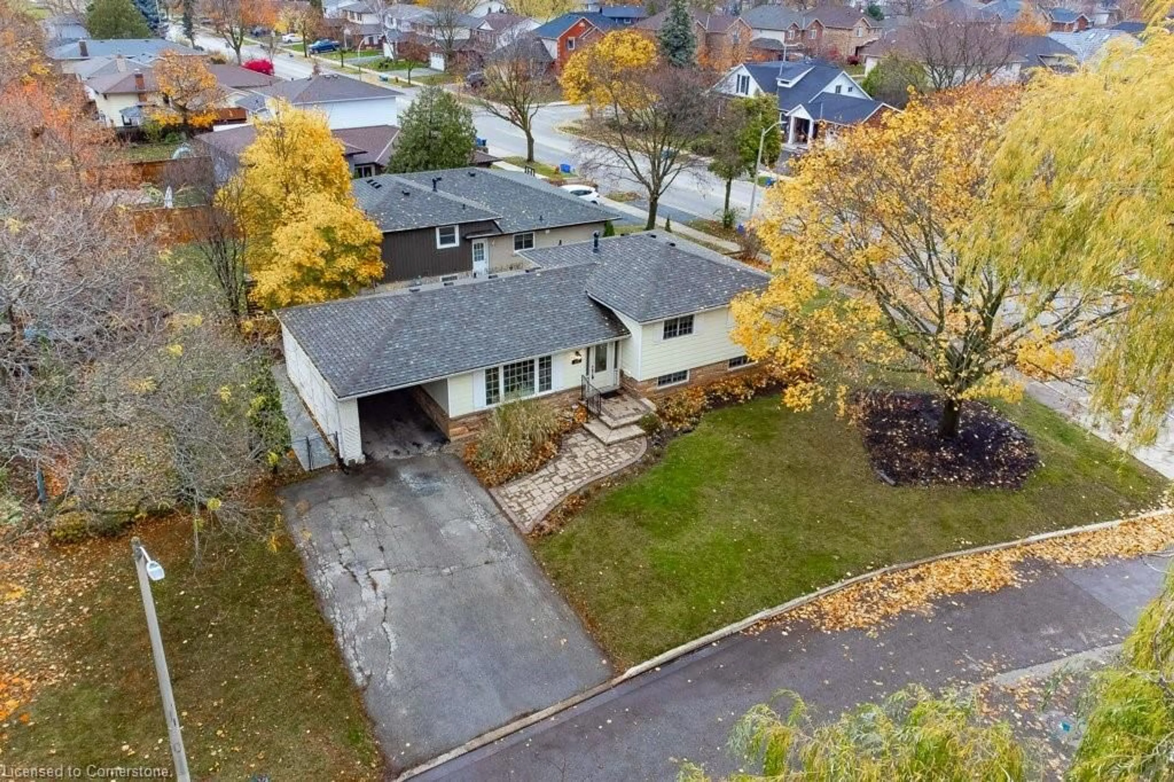 A pic from exterior of the house or condo, the fenced backyard for 533 Galway Dr, Burlington Ontario L7L 2S6