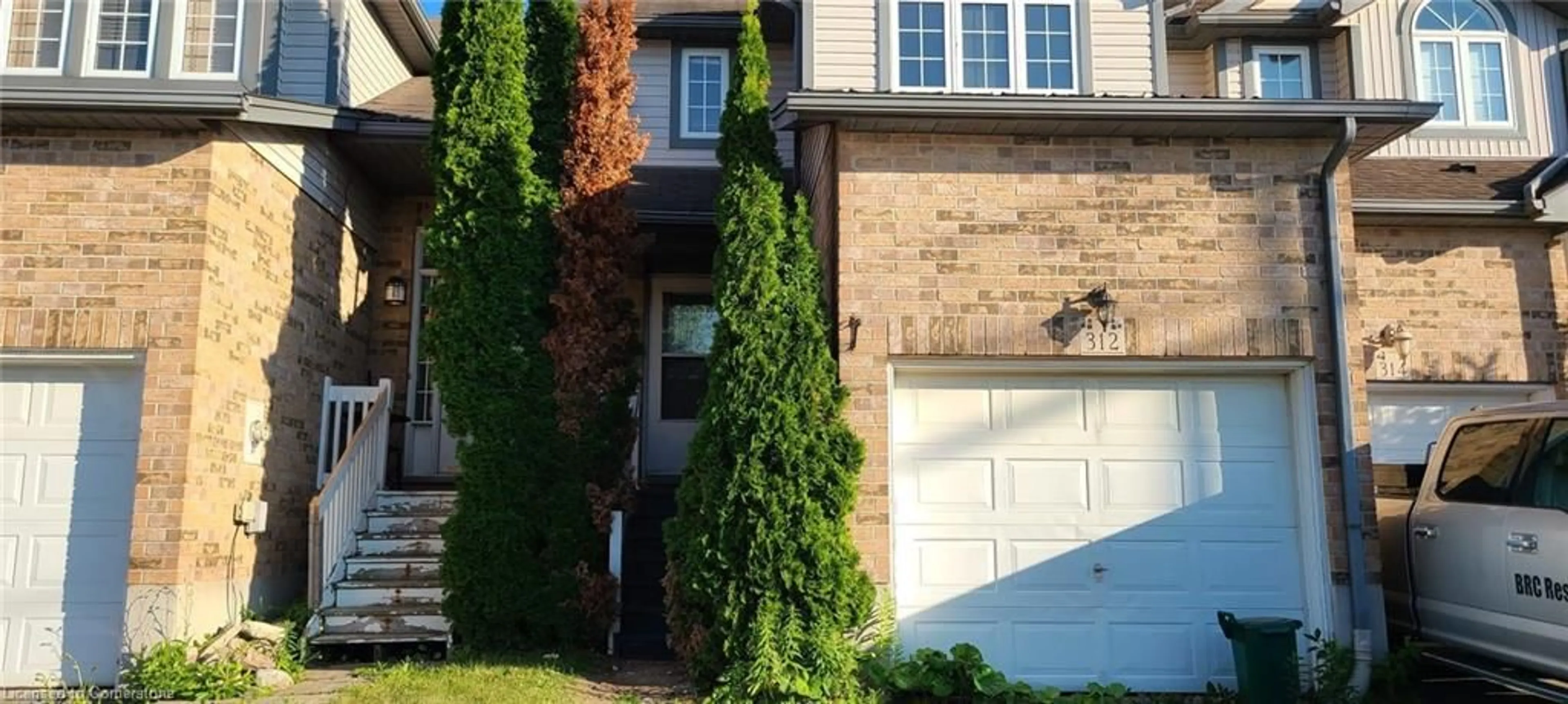 Frontside or backside of a home, the street view for 312 Activa Ave, Kitchener Ontario N2E 3E1