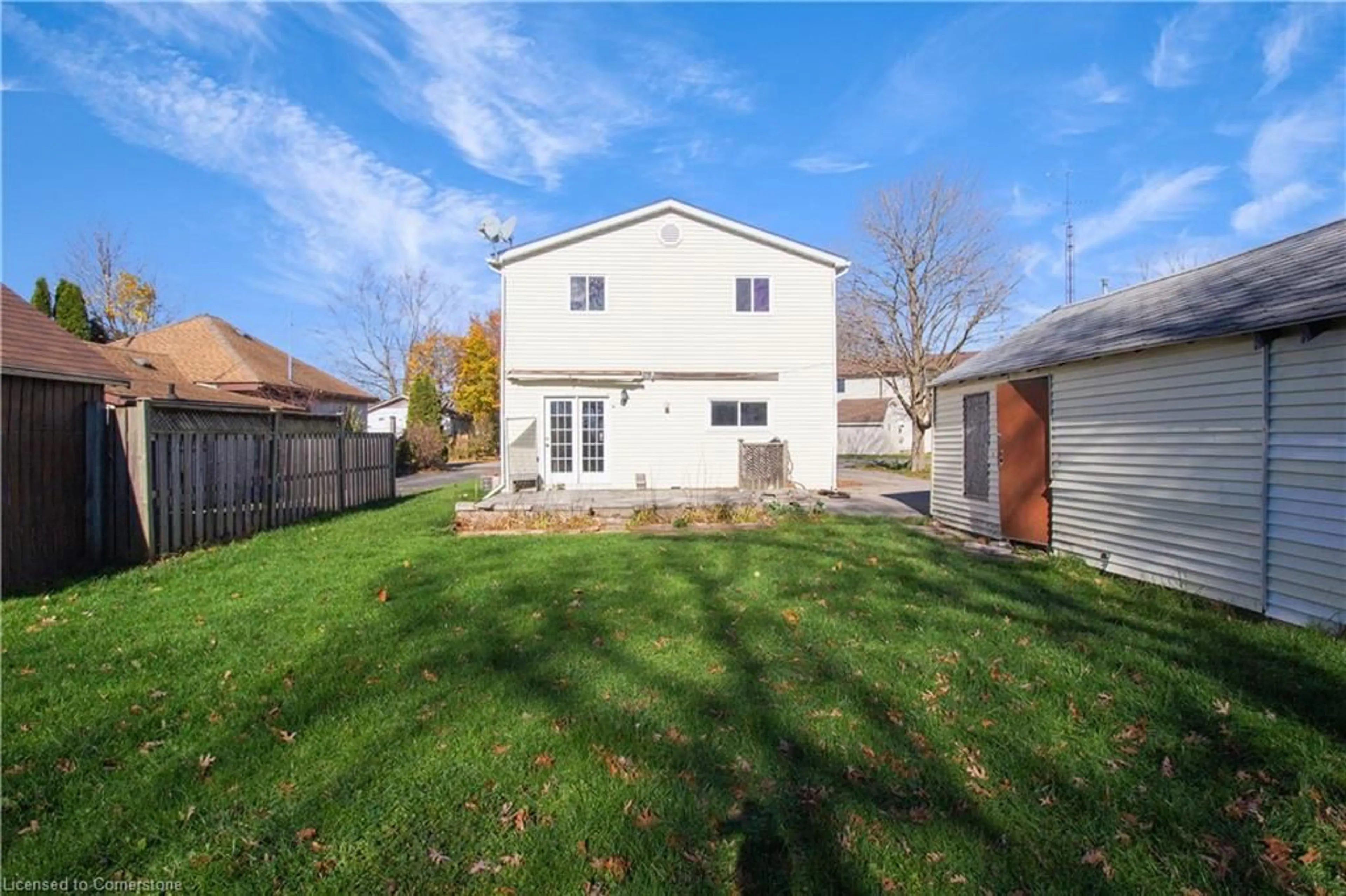 Frontside or backside of a home, the fenced backyard for 5 Porter Ave, Hagersville Ontario N0A 1H0