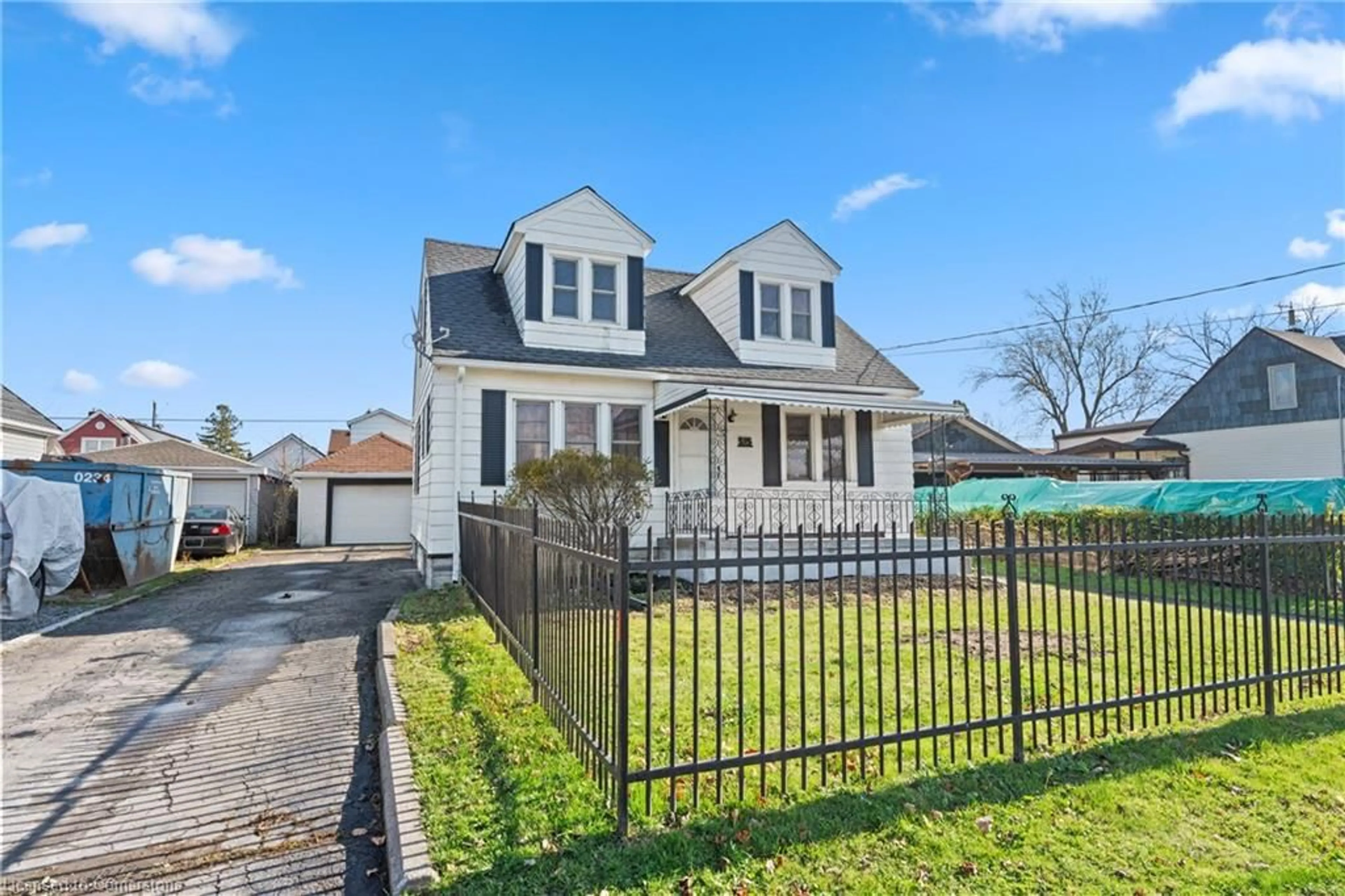 Frontside or backside of a home, the fenced backyard for 515 Deere St, Welland Ontario L3B 2M1