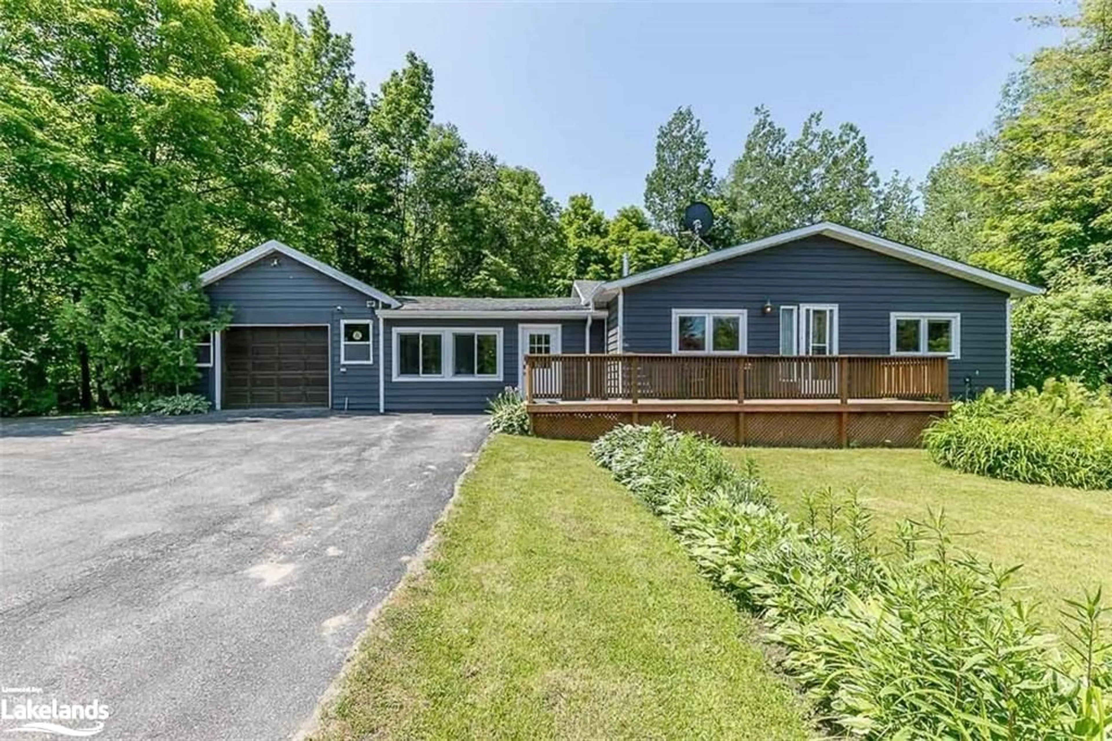 Frontside or backside of a home, cottage for 2440 Champlain Rd, Tiny Ontario L9M 0C9