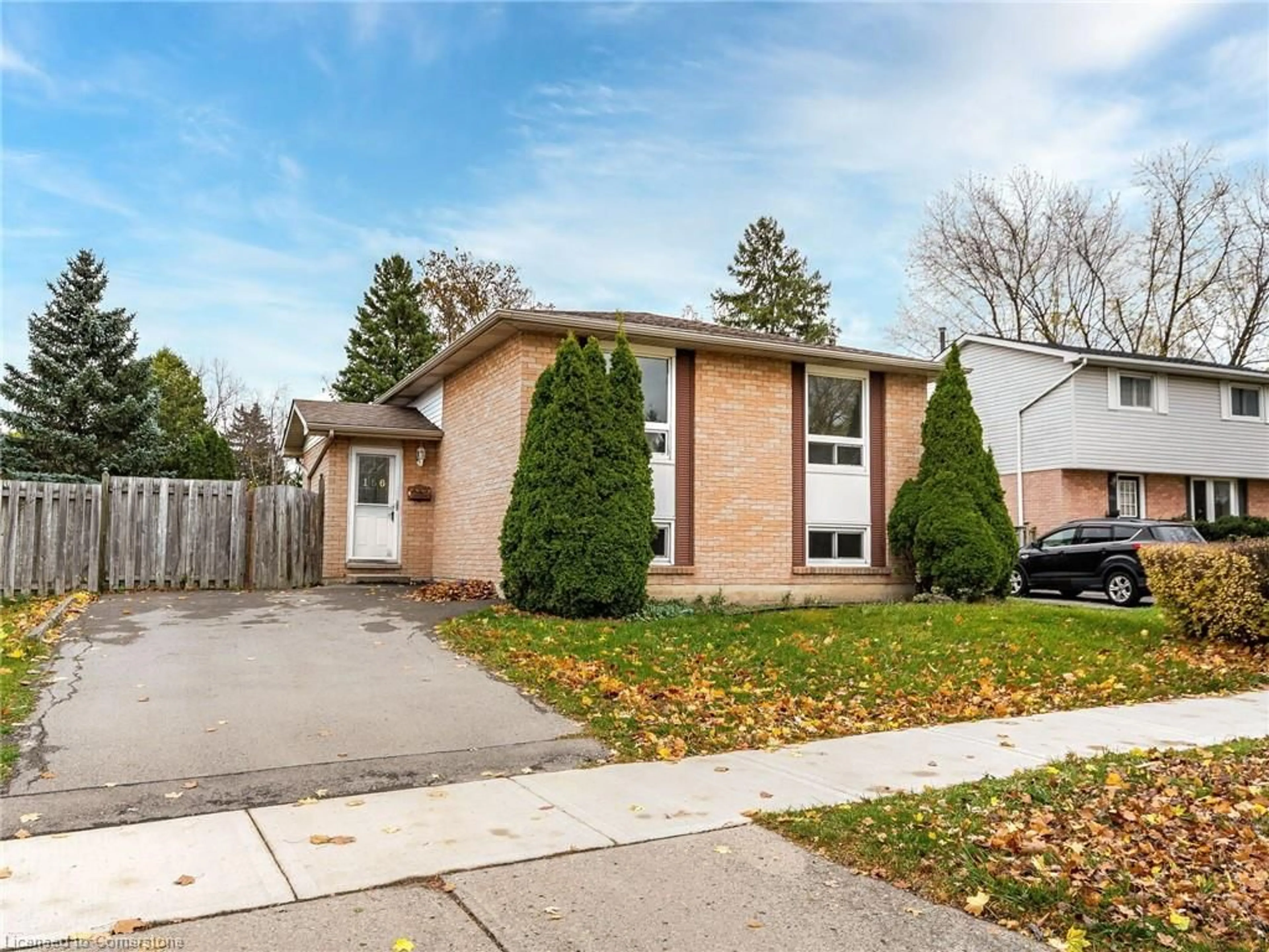 Frontside or backside of a home, the fenced backyard for 156 Gordon Drummond Ave, Stoney Creek Ontario L8J 1G4