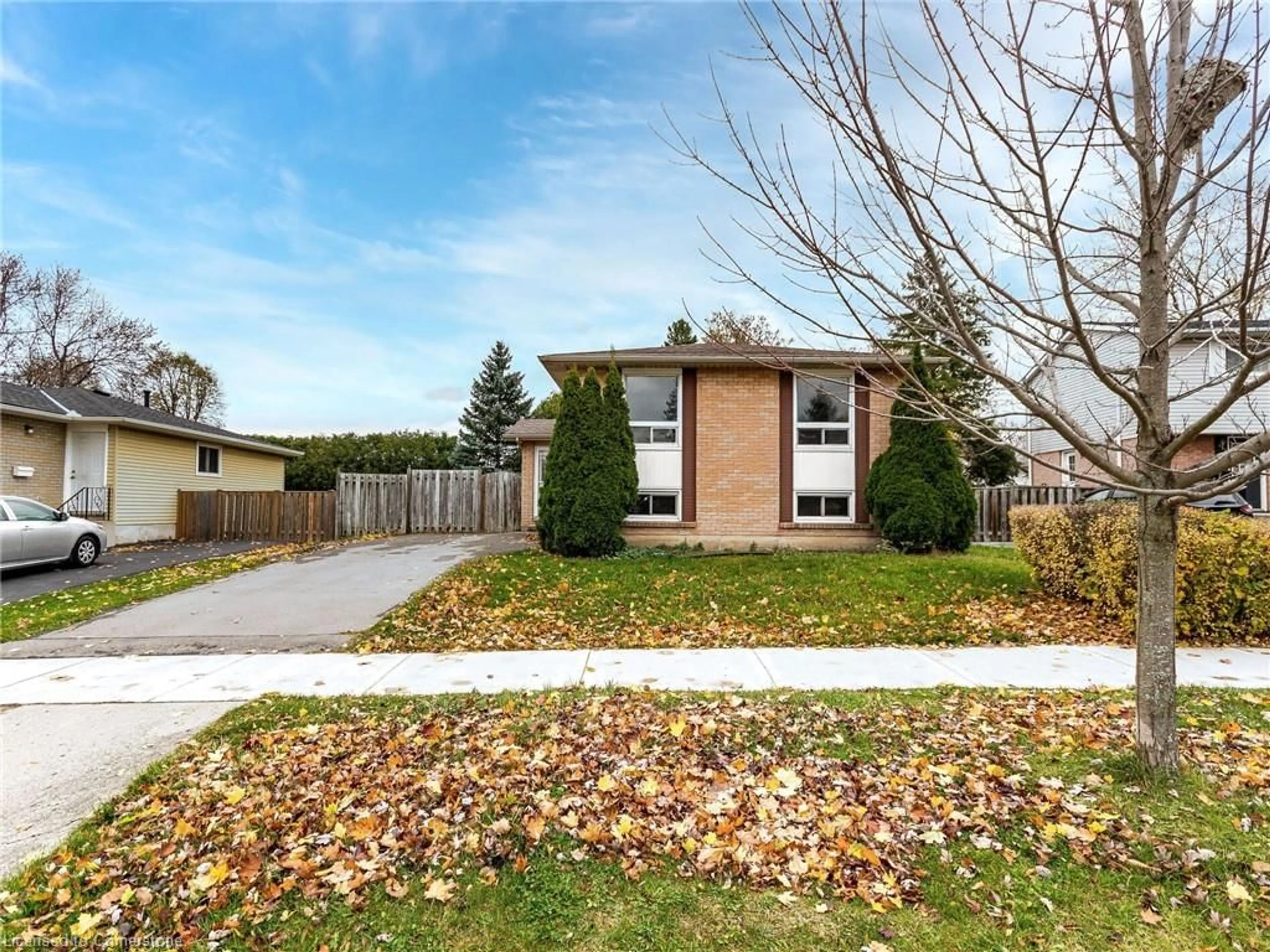 Frontside or backside of a home, the fenced backyard for 156 Gordon Drummond Ave, Stoney Creek Ontario L8J 1G4