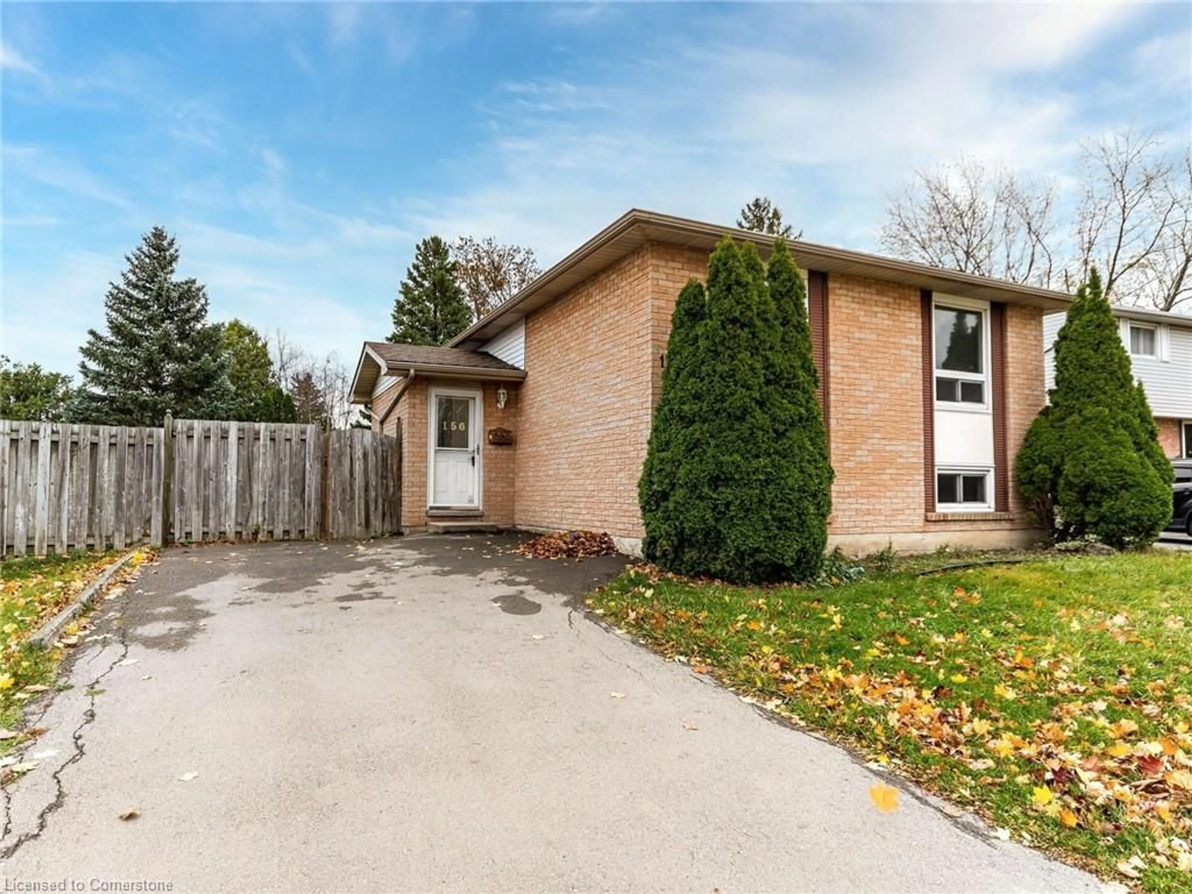 Frontside or backside of a home, the fenced backyard for 156 Gordon Drummond Ave, Stoney Creek Ontario L8J 1G4