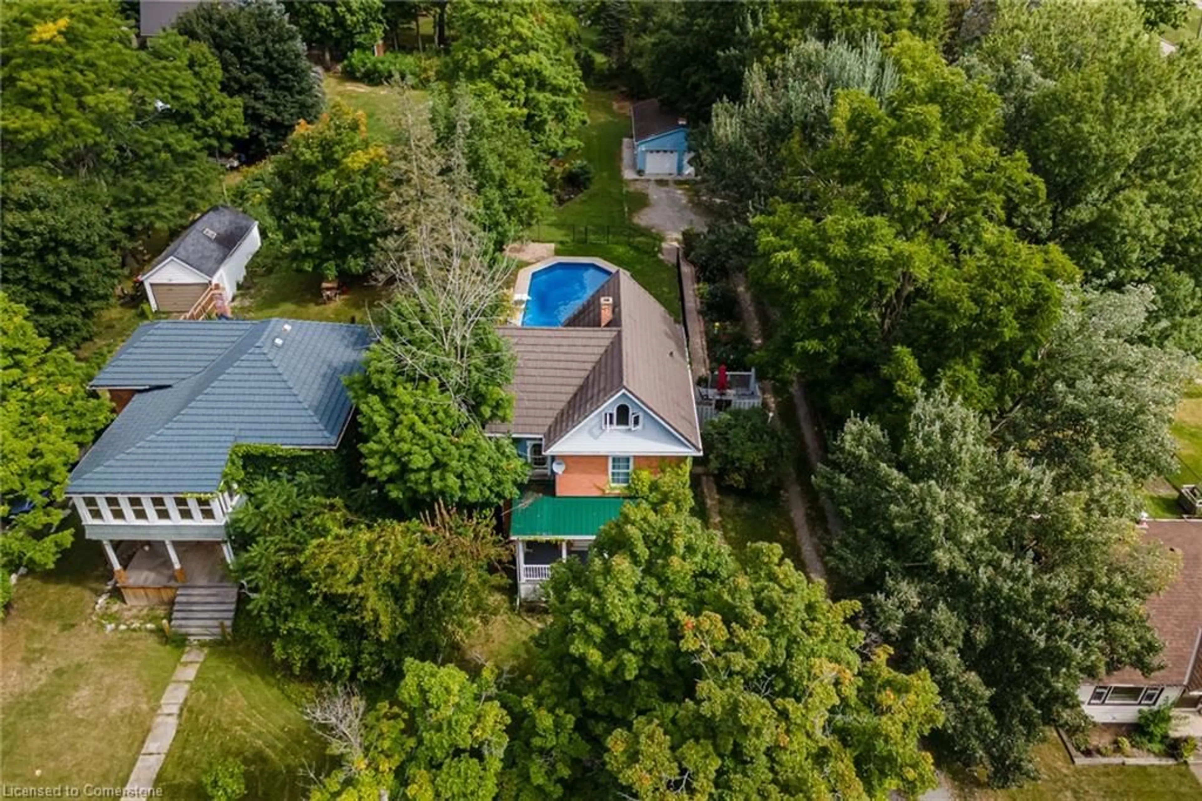 Frontside or backside of a home, the fenced backyard for 94 Sutherland St, Caledonia Ontario N3W 1B4