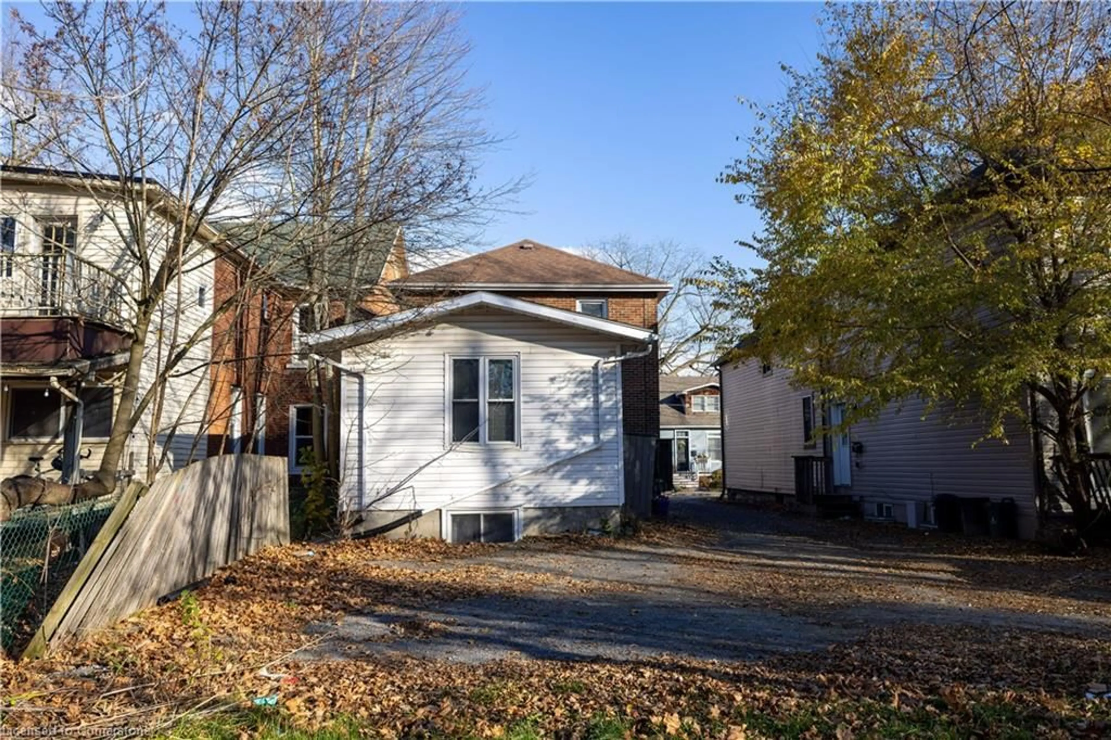 Frontside or backside of a home, the fenced backyard for 150 Nelson St, Kingston Ontario K7L 3X1