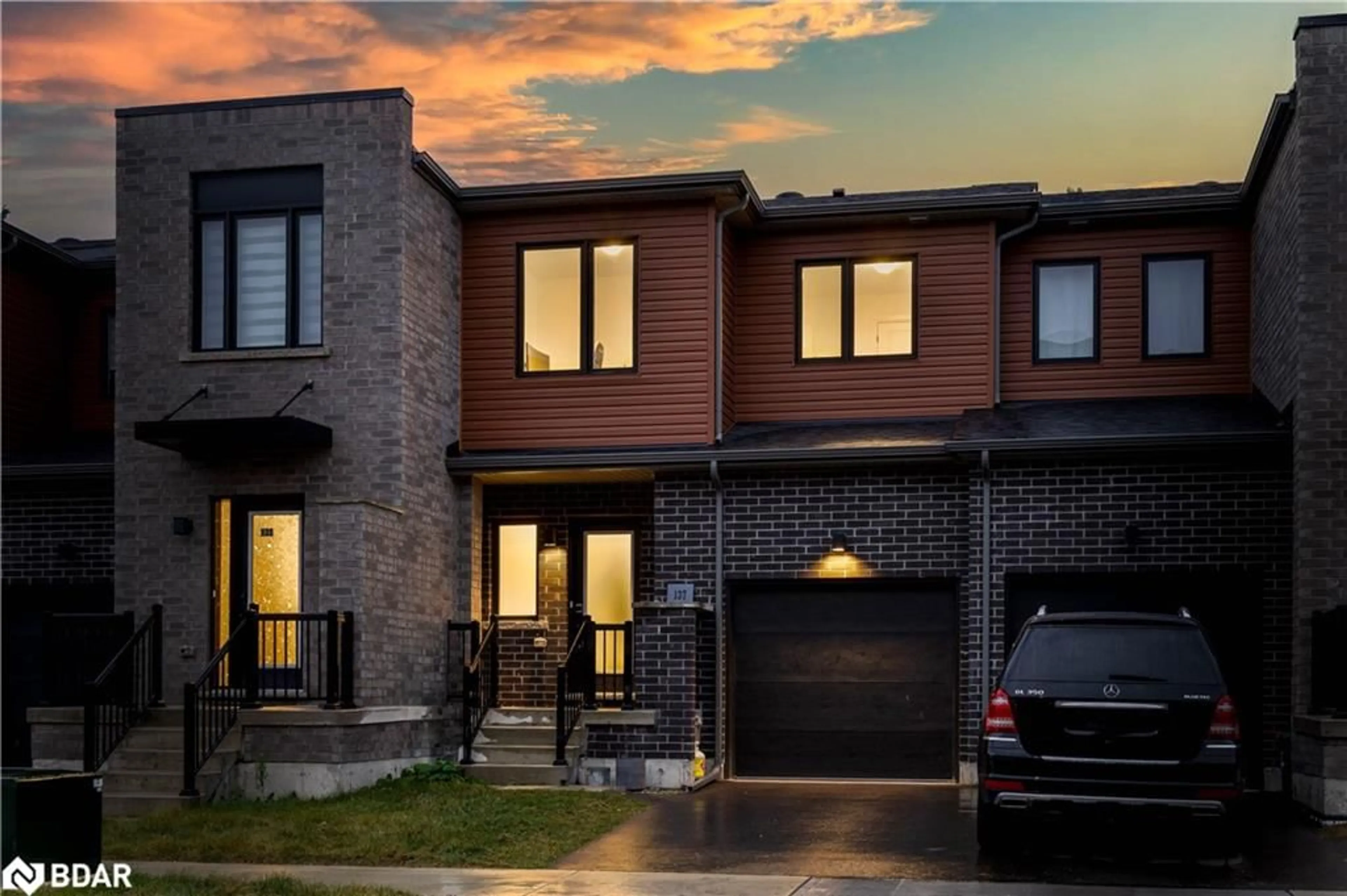 Home with brick exterior material for 137 Turnberry Lane, Barrie Ontario L9J 0M8