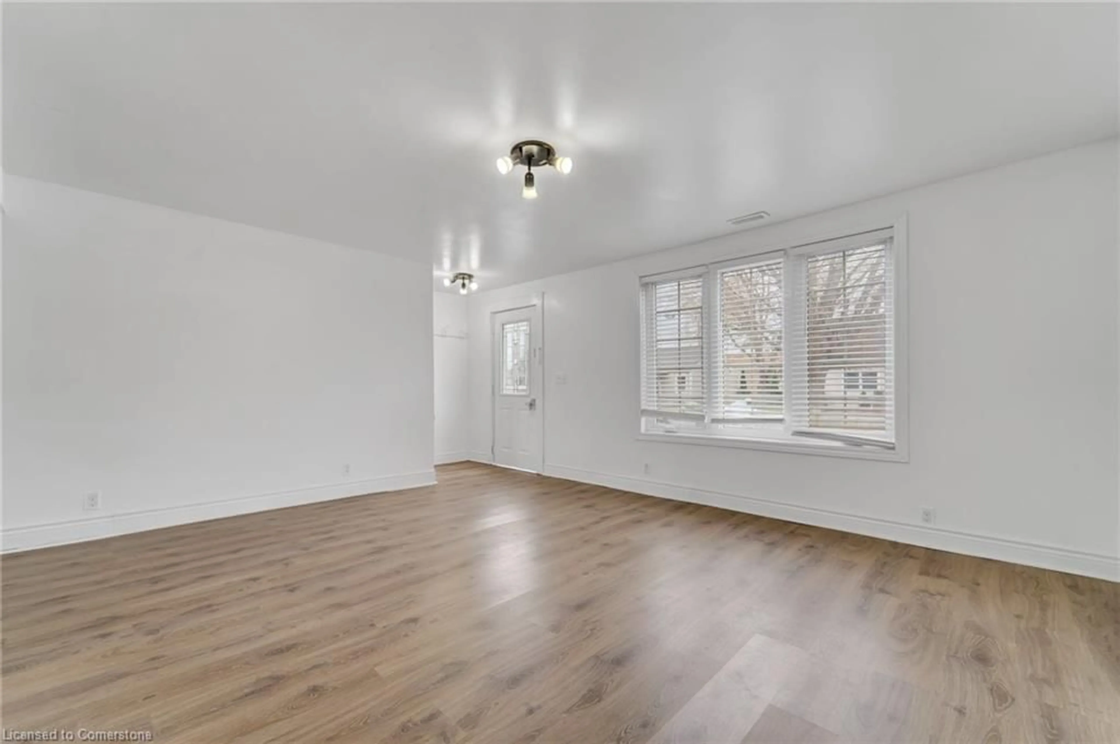 A pic of a room, wood floors for 354 Crowland Ave, Niagara Falls Ontario L3B 1X7