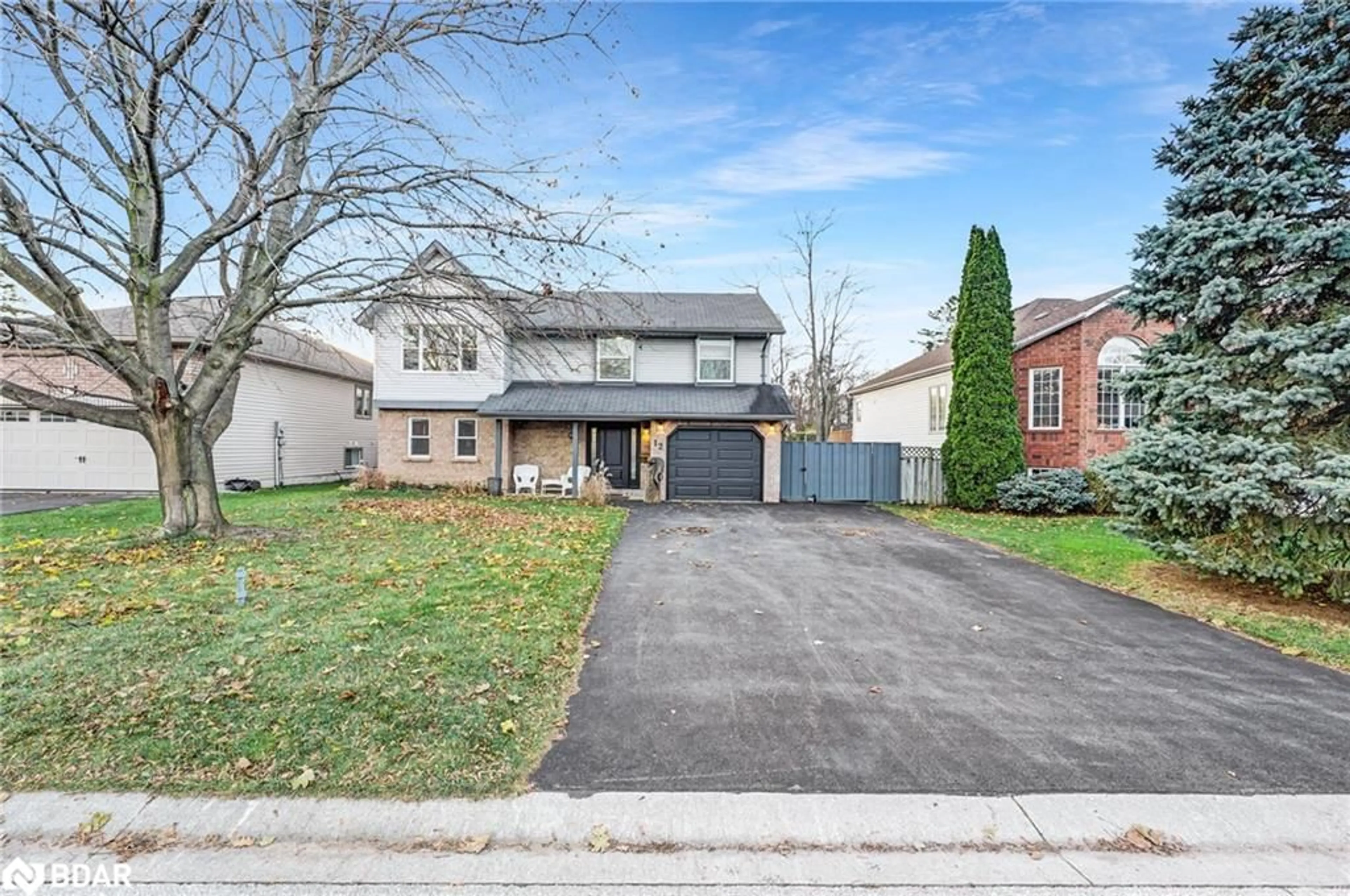 Frontside or backside of a home, the street view for 12 Riverdale Dr, Wasaga Beach Ontario L9Z 1E9