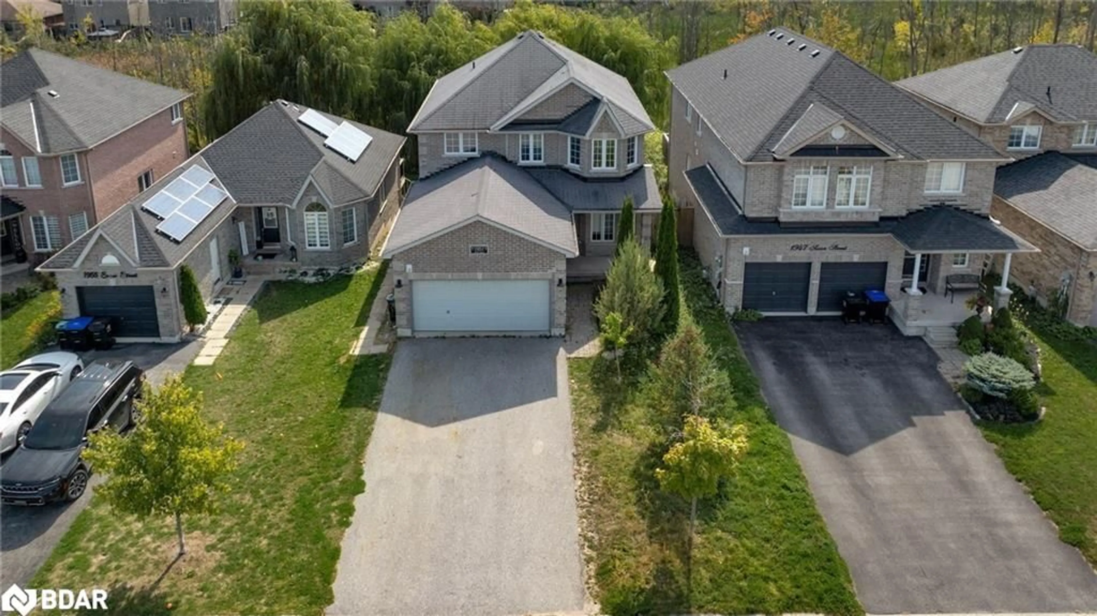 Frontside or backside of a home, the street view for 1951 Swan St, Innisfil Ontario L9S 0B4