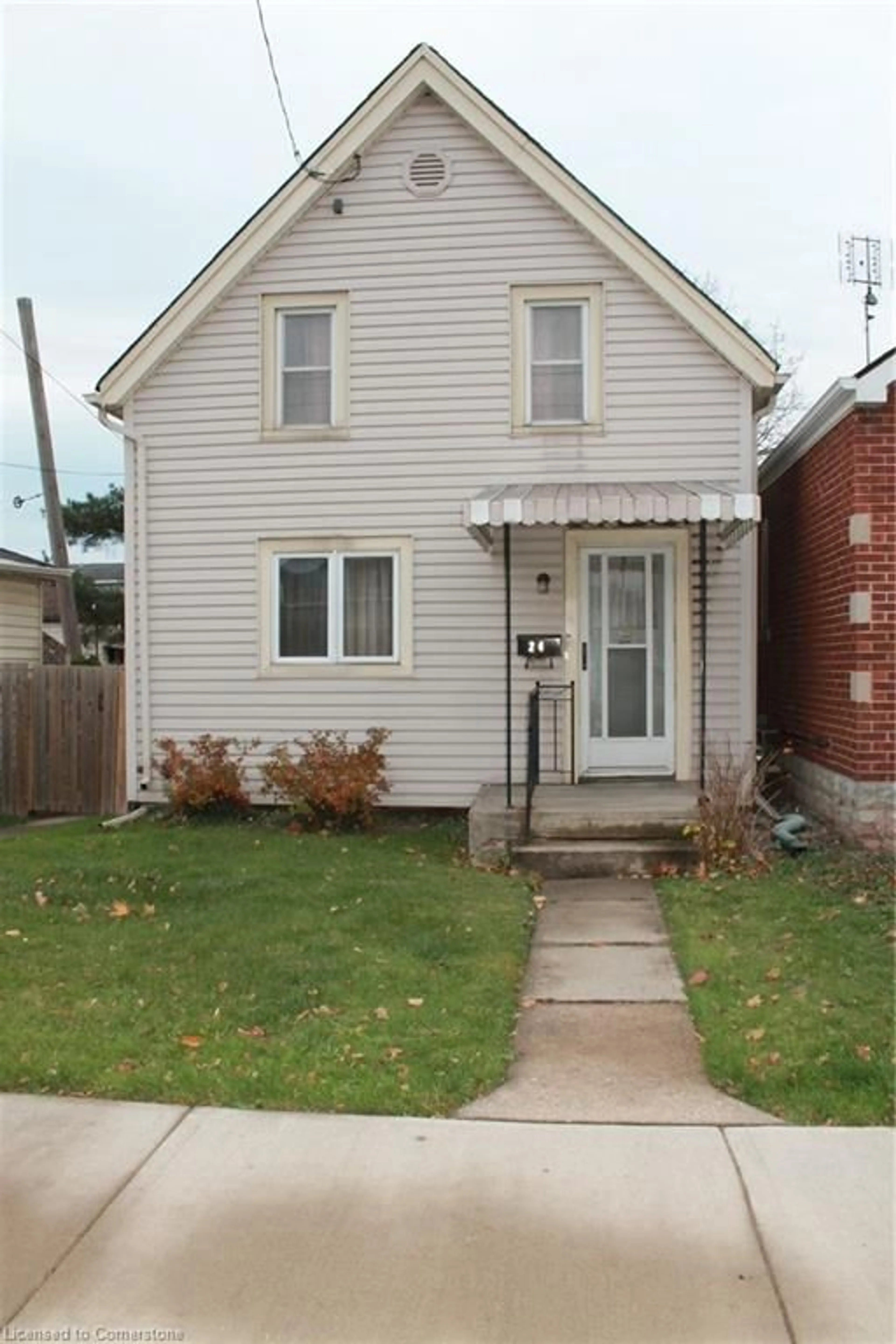 Frontside or backside of a home, cottage for 24 Carlisle St, Hamilton Ontario L8H 4C3