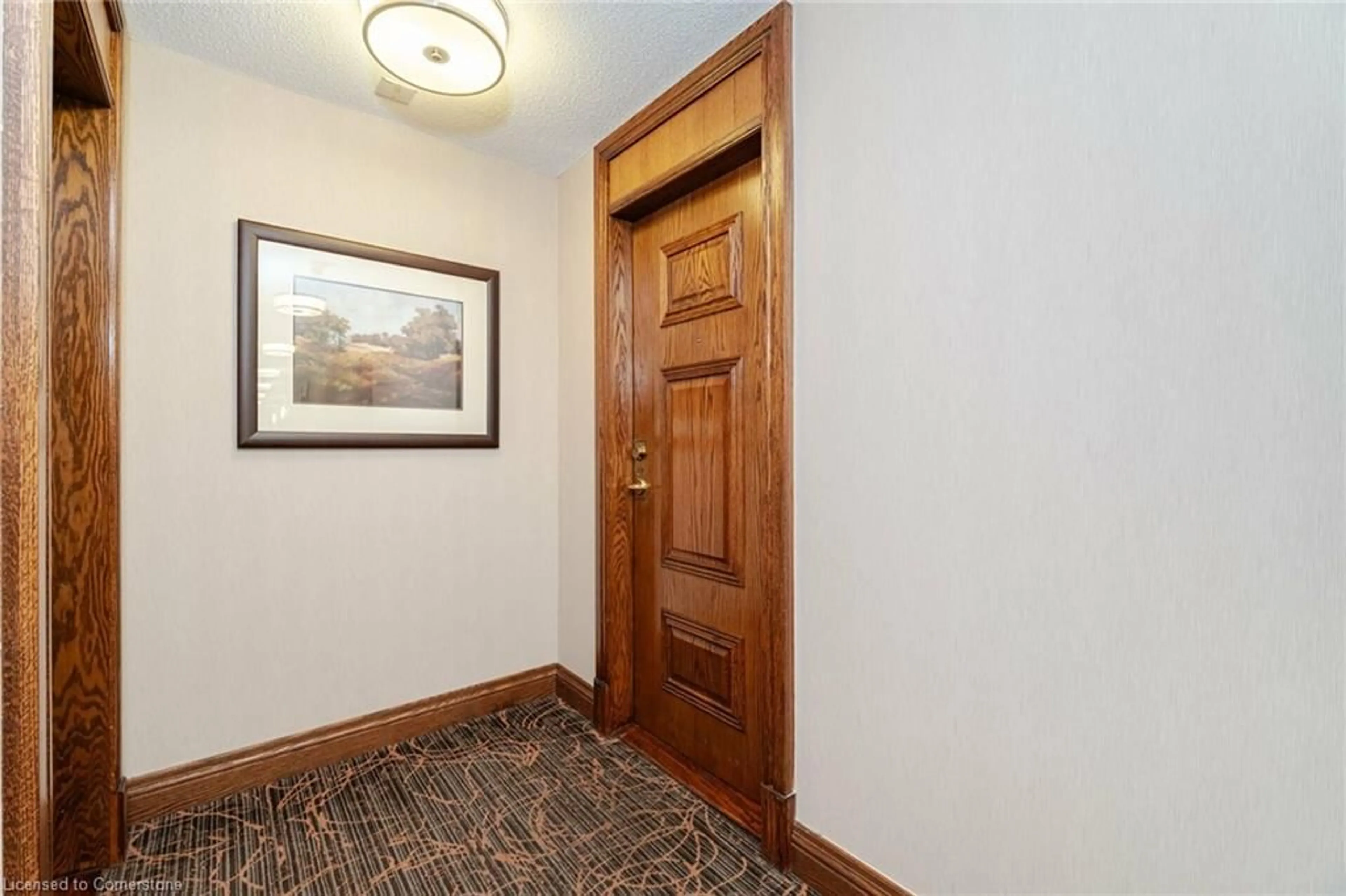 Indoor foyer, wood floors for 4879 Kimbermount Ave #304, Mississauga Ontario L5M 7R8