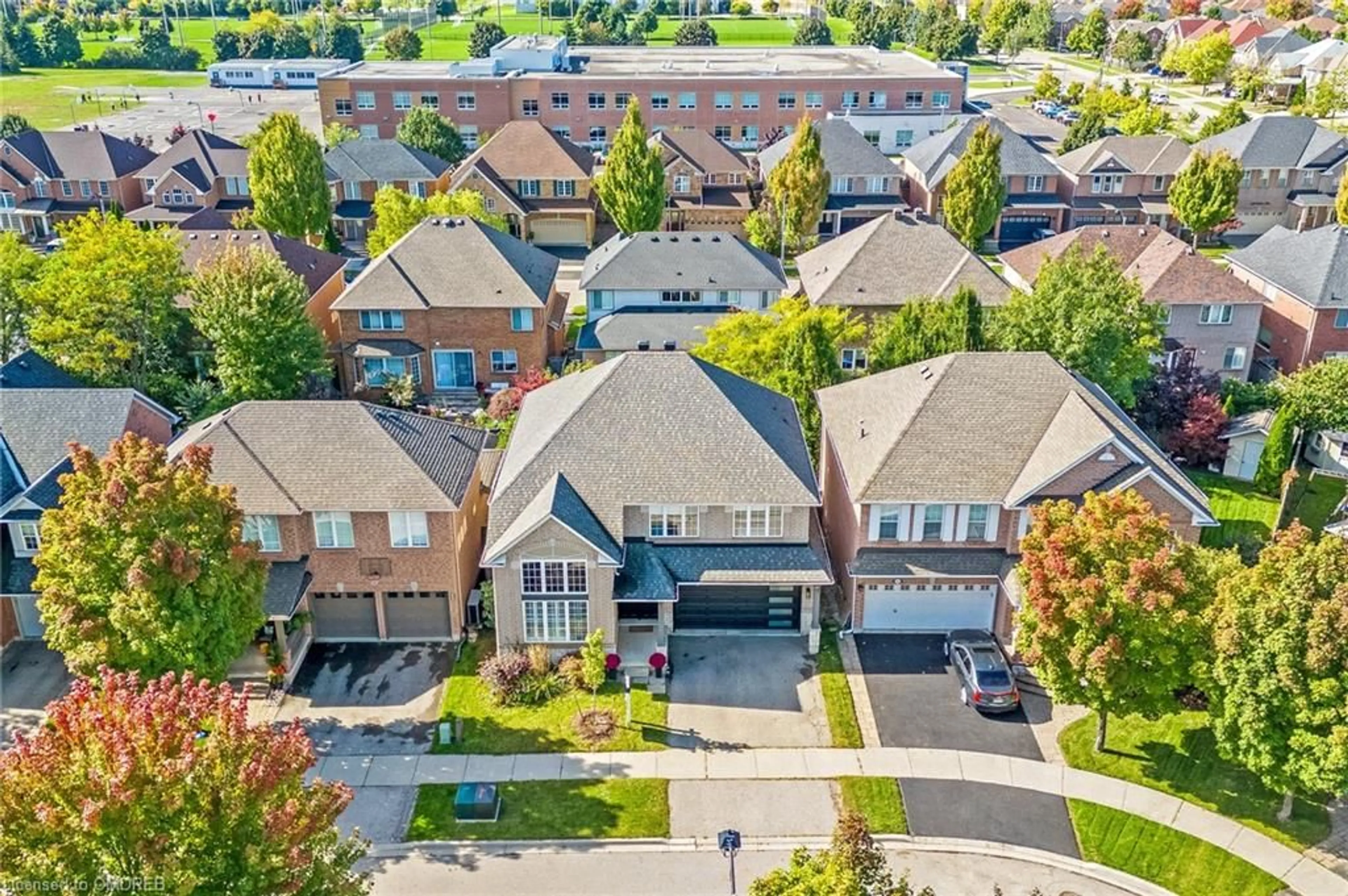 Frontside or backside of a home, the street view for 1260 Pepperbush Pl, Oakville Ontario L6M 4B7