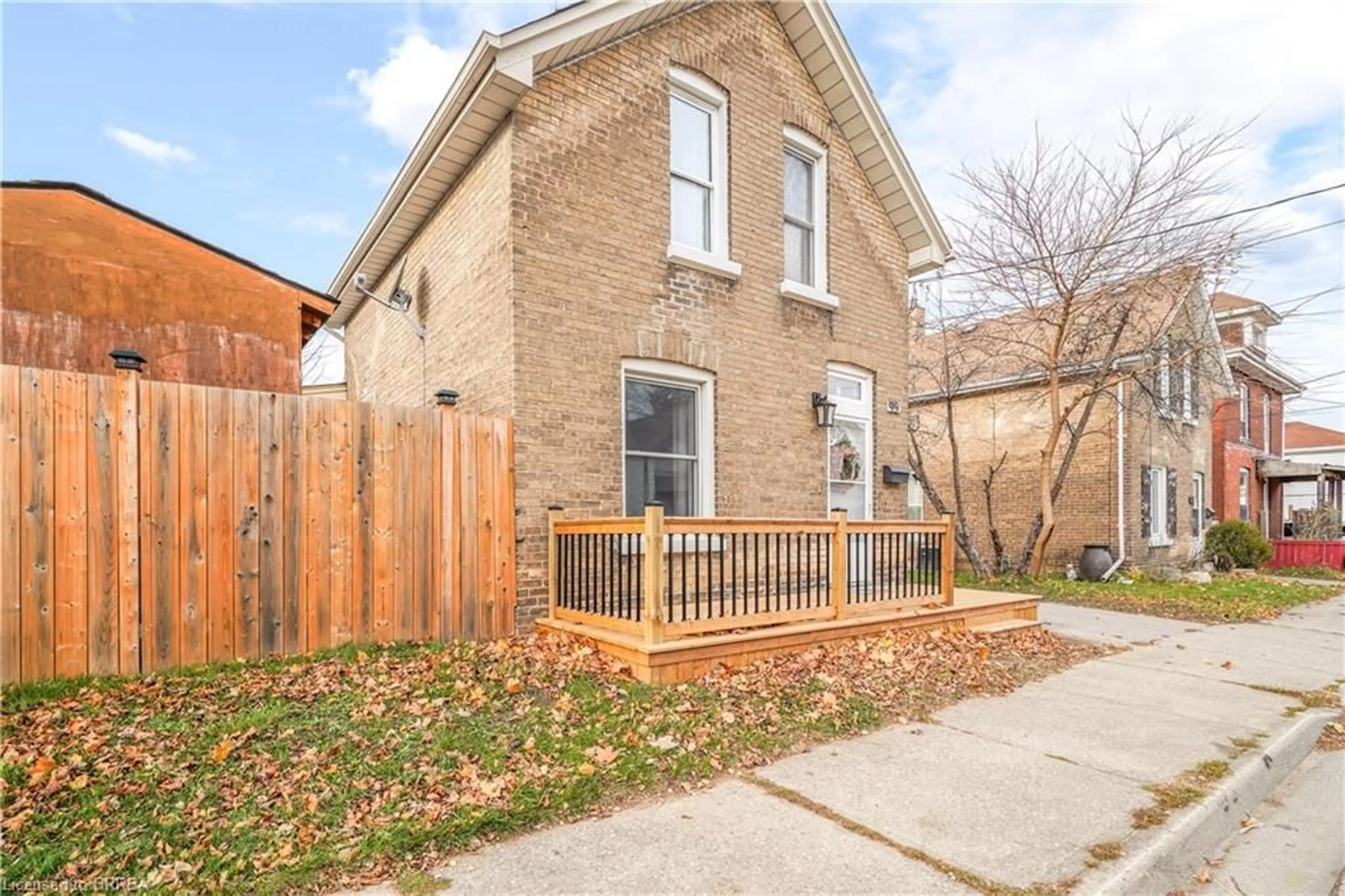 Frontside or backside of a home, the fenced backyard for 99 Superior St, Brantford Ontario N3S 2K7