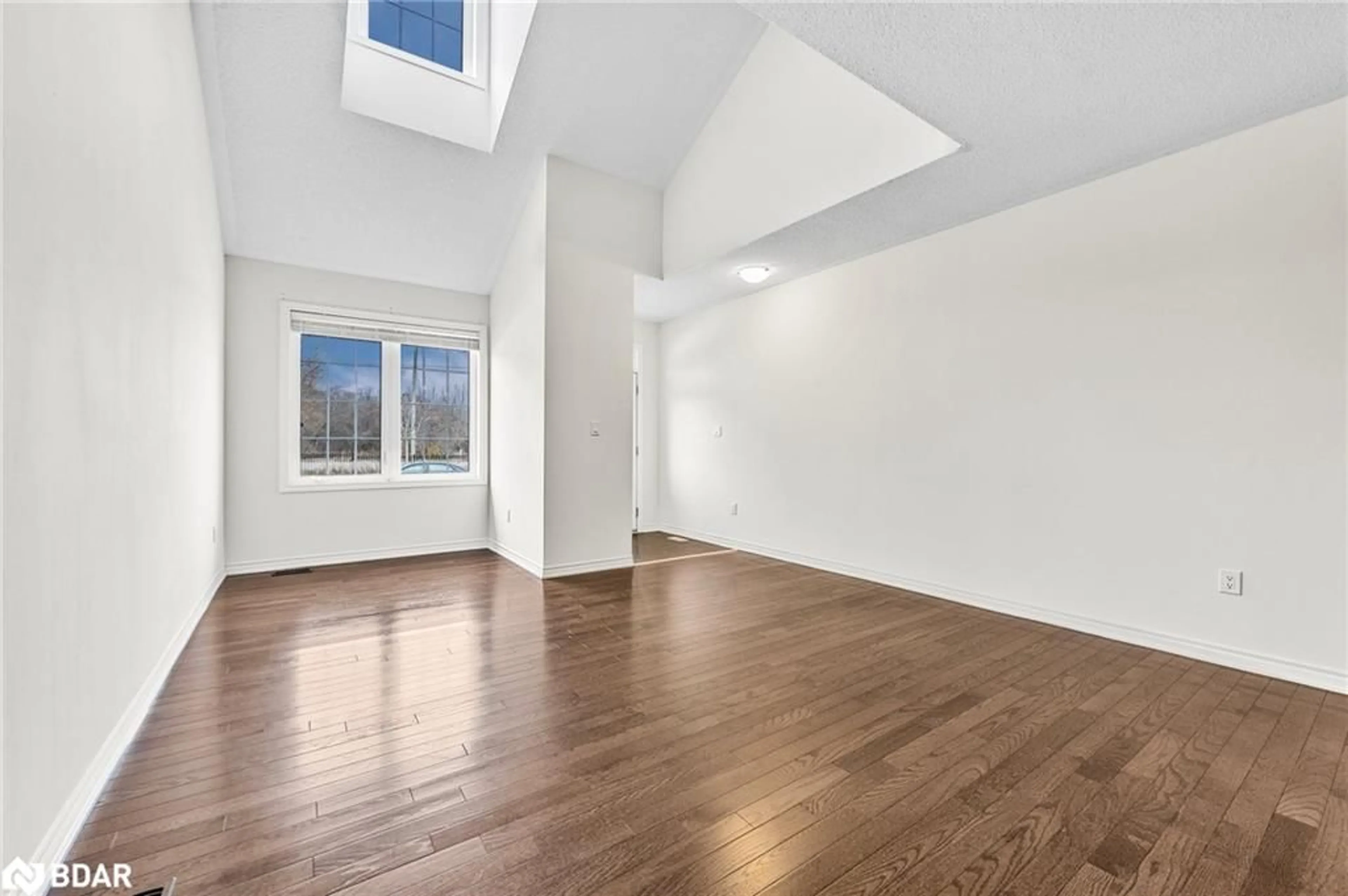 A pic of a room, wood floors for 13 Appalachian Trail, Wasaga Beach Ontario L9Z 0G3