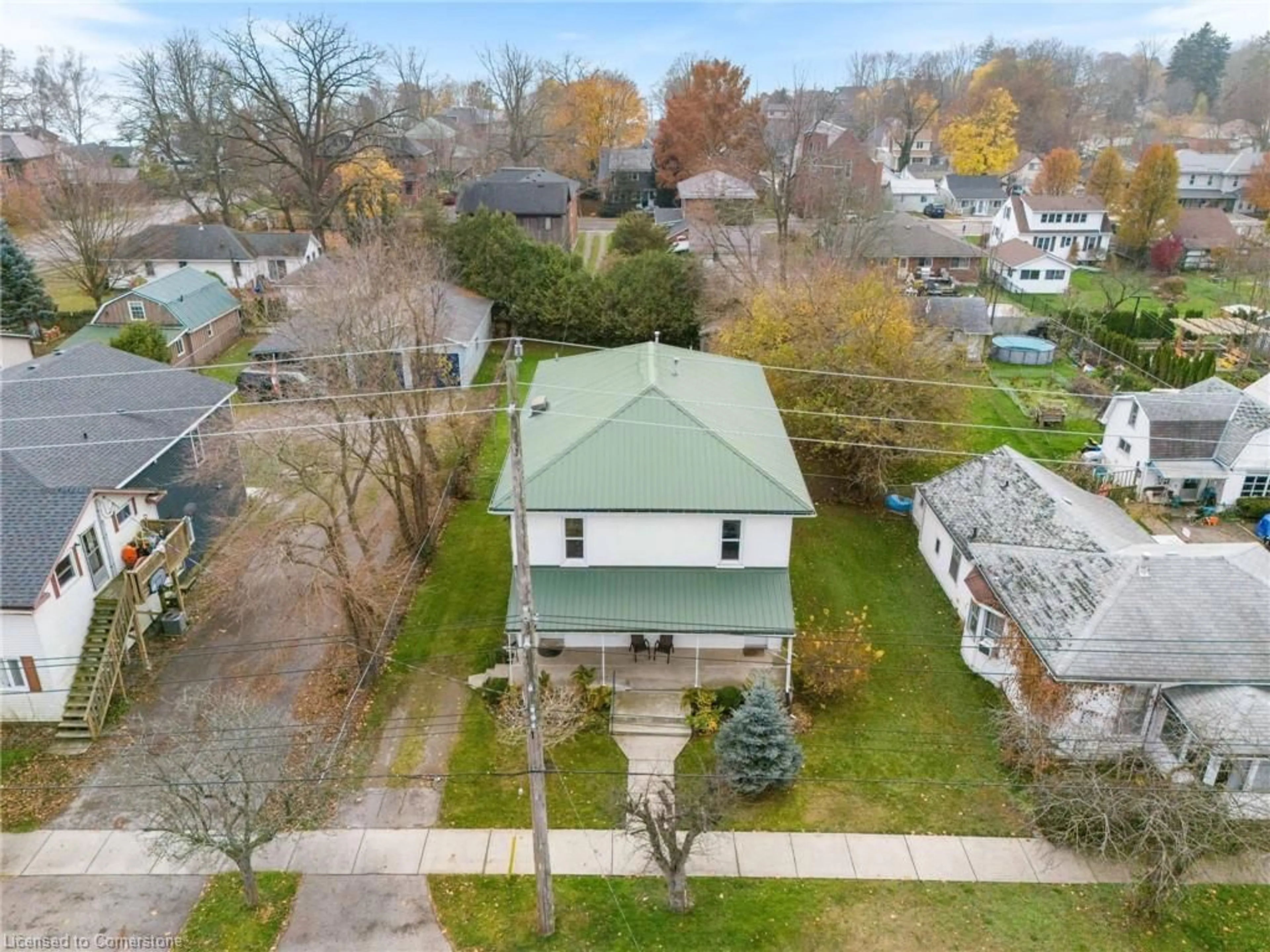 Frontside or backside of a home, the fenced backyard for 311 St George St, Port Dover Ontario N0A 1N0