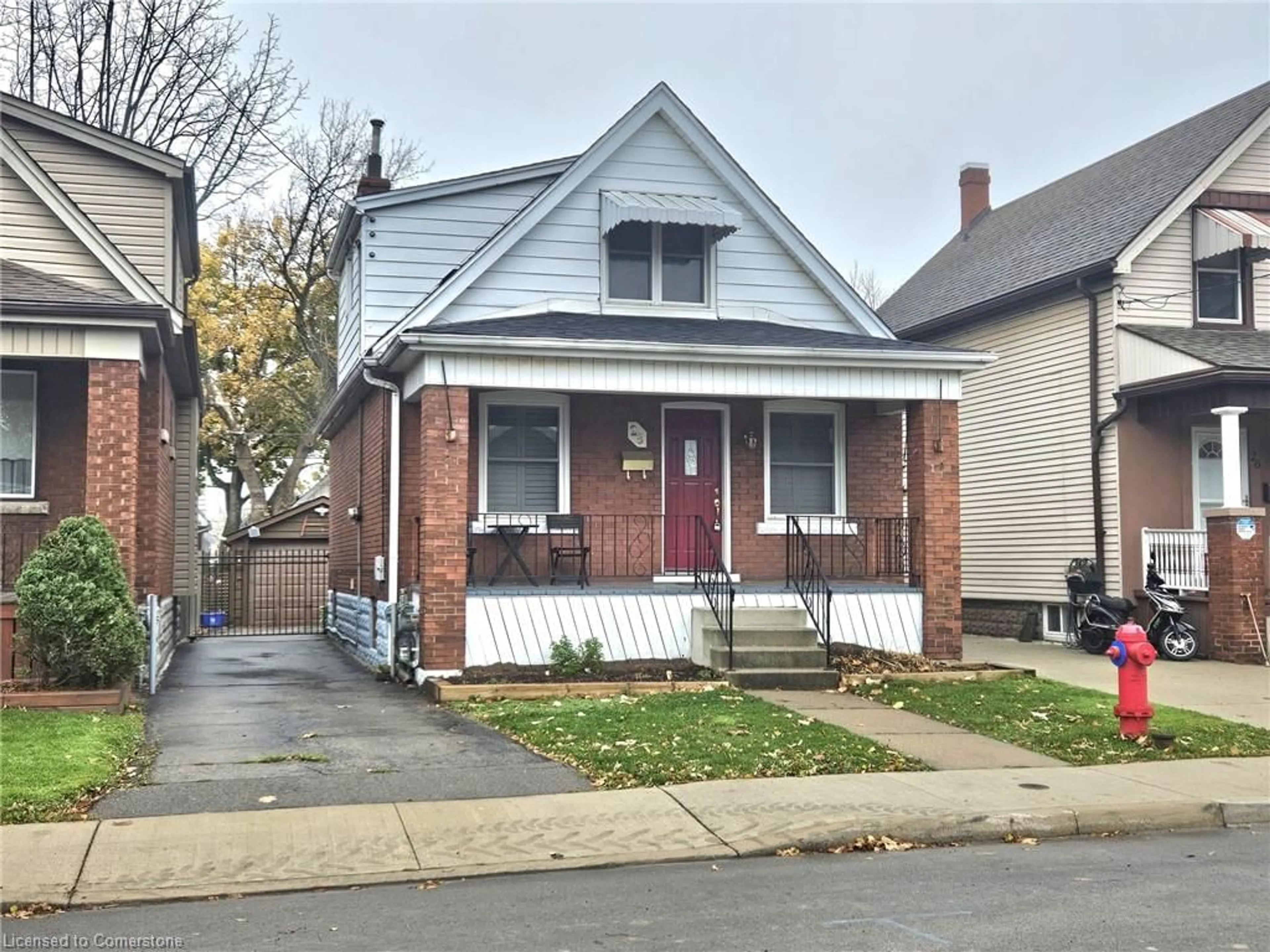 Frontside or backside of a home, the street view for 28 Cameron Ave, Hamilton Ontario L8H 4Y8