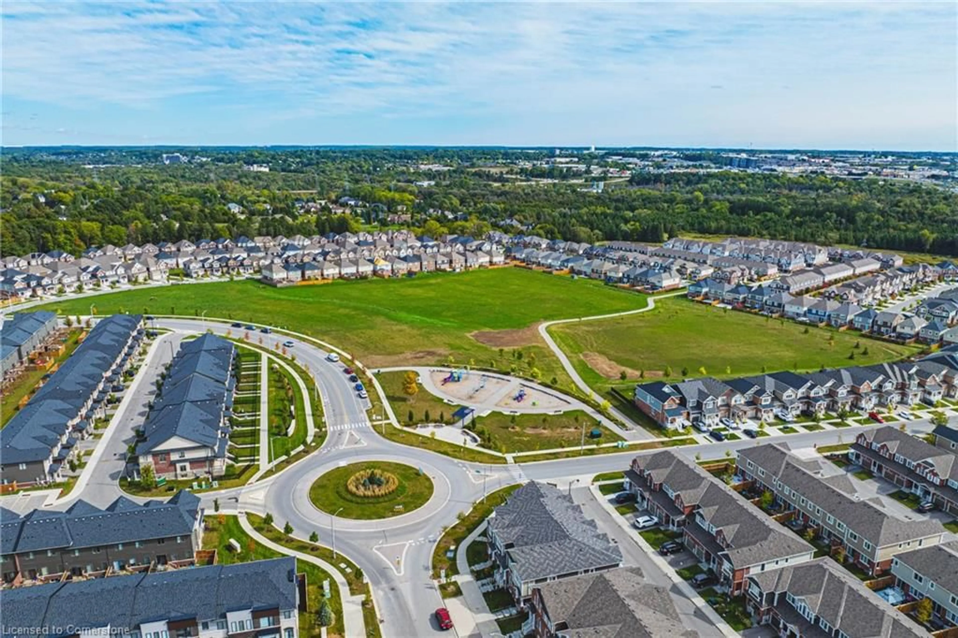 A pic from exterior of the house or condo, the fenced backyard for 155 Equestrian Way #60, Cambridge Ontario N3E 0E8