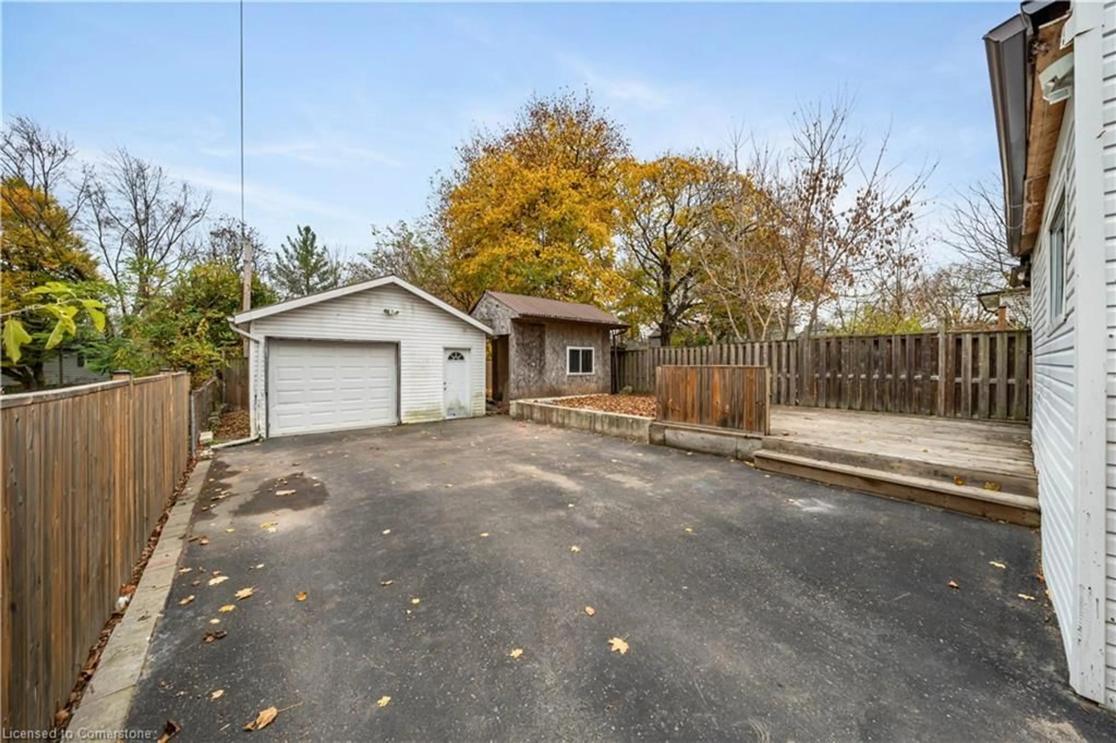 Frontside or backside of a home, the fenced backyard for 4910 Morrison St, Niagara Falls Ontario L2E 2C5