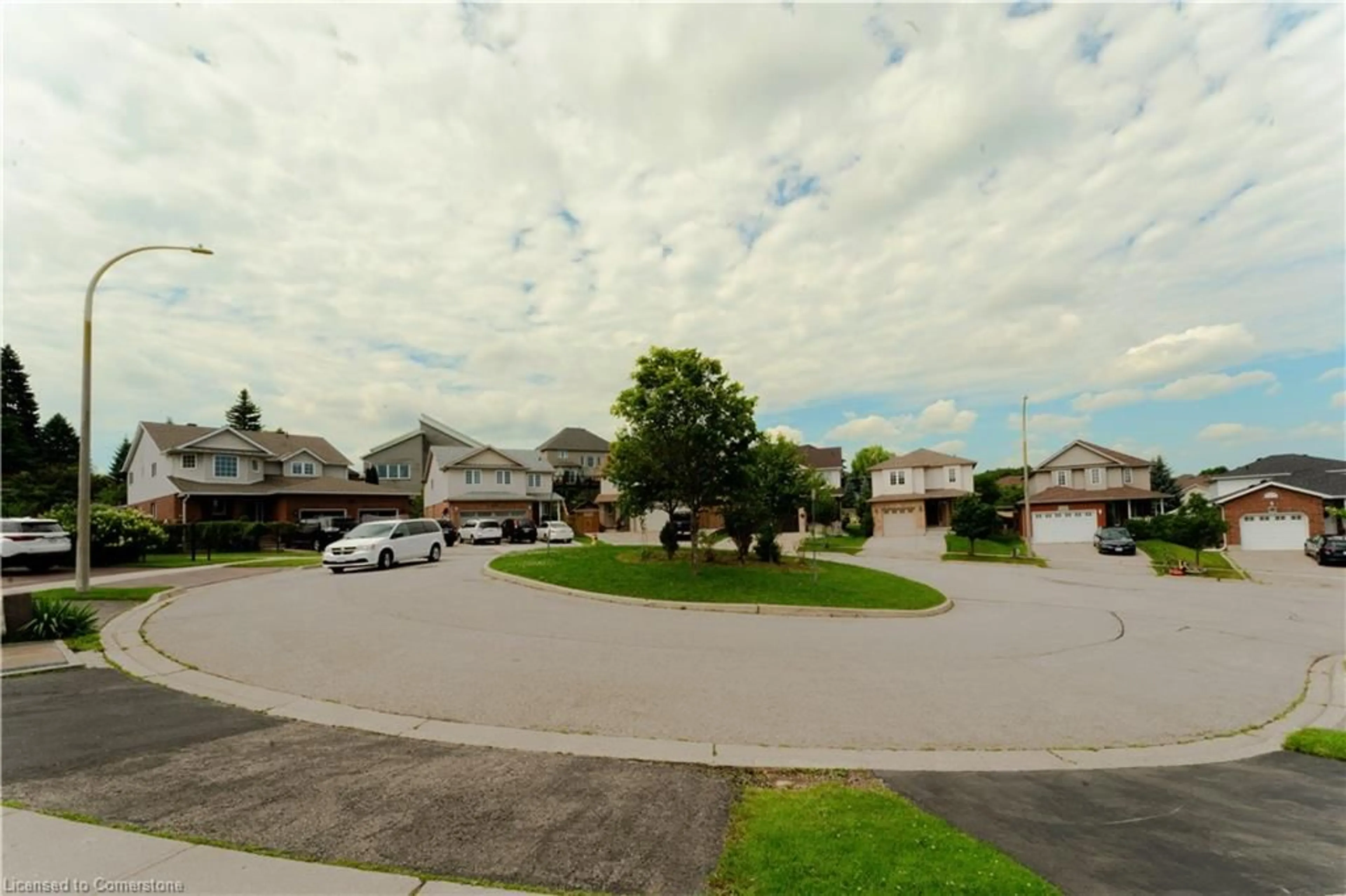 Frontside or backside of a home, the street view for 53 Sandwell Crt, Kitchener Ontario N2A 4H9