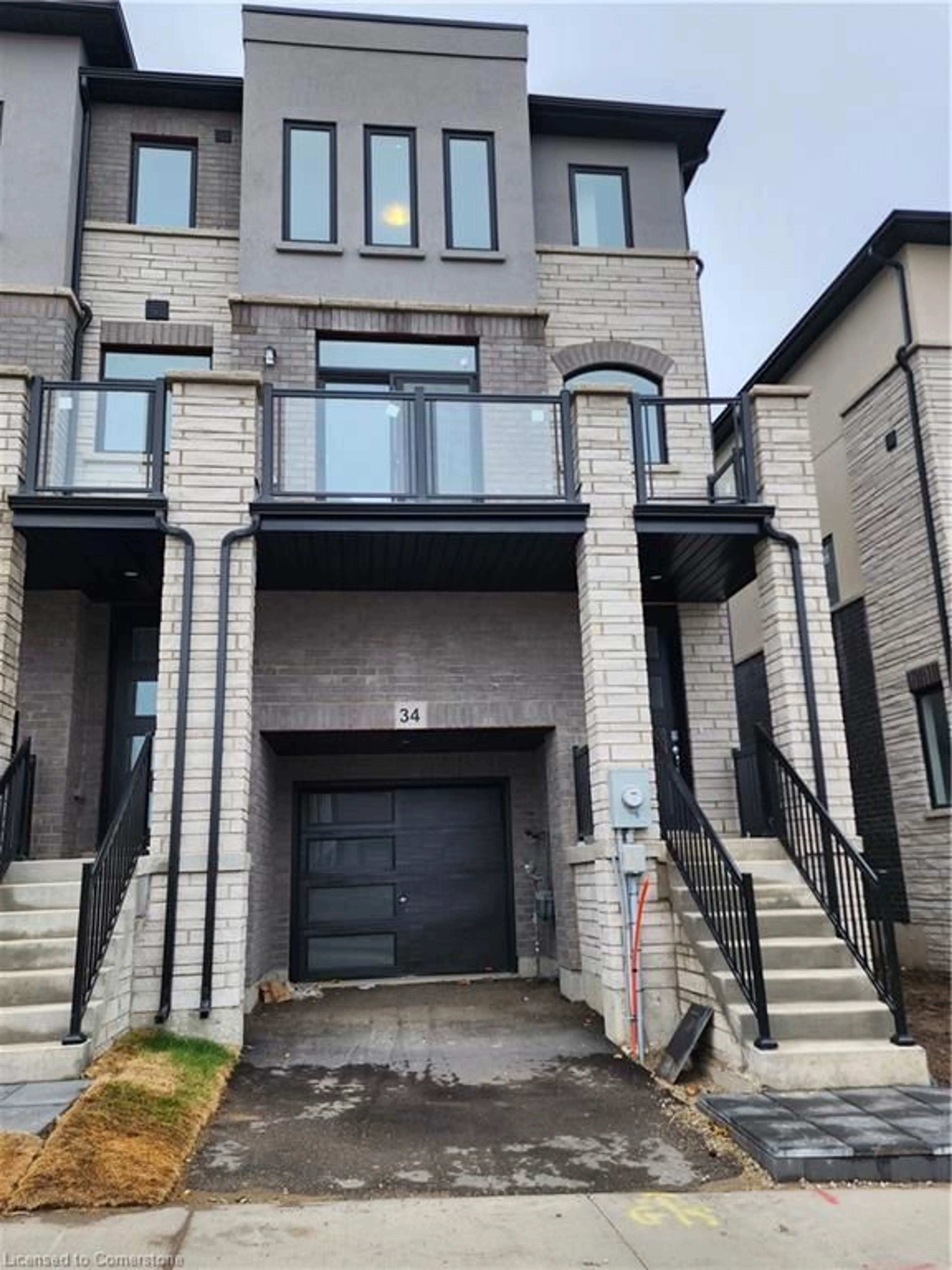 A pic from exterior of the house or condo, the front or back of building for 155 Equestrian Way #34, Cambridge Ontario N3E 0E8