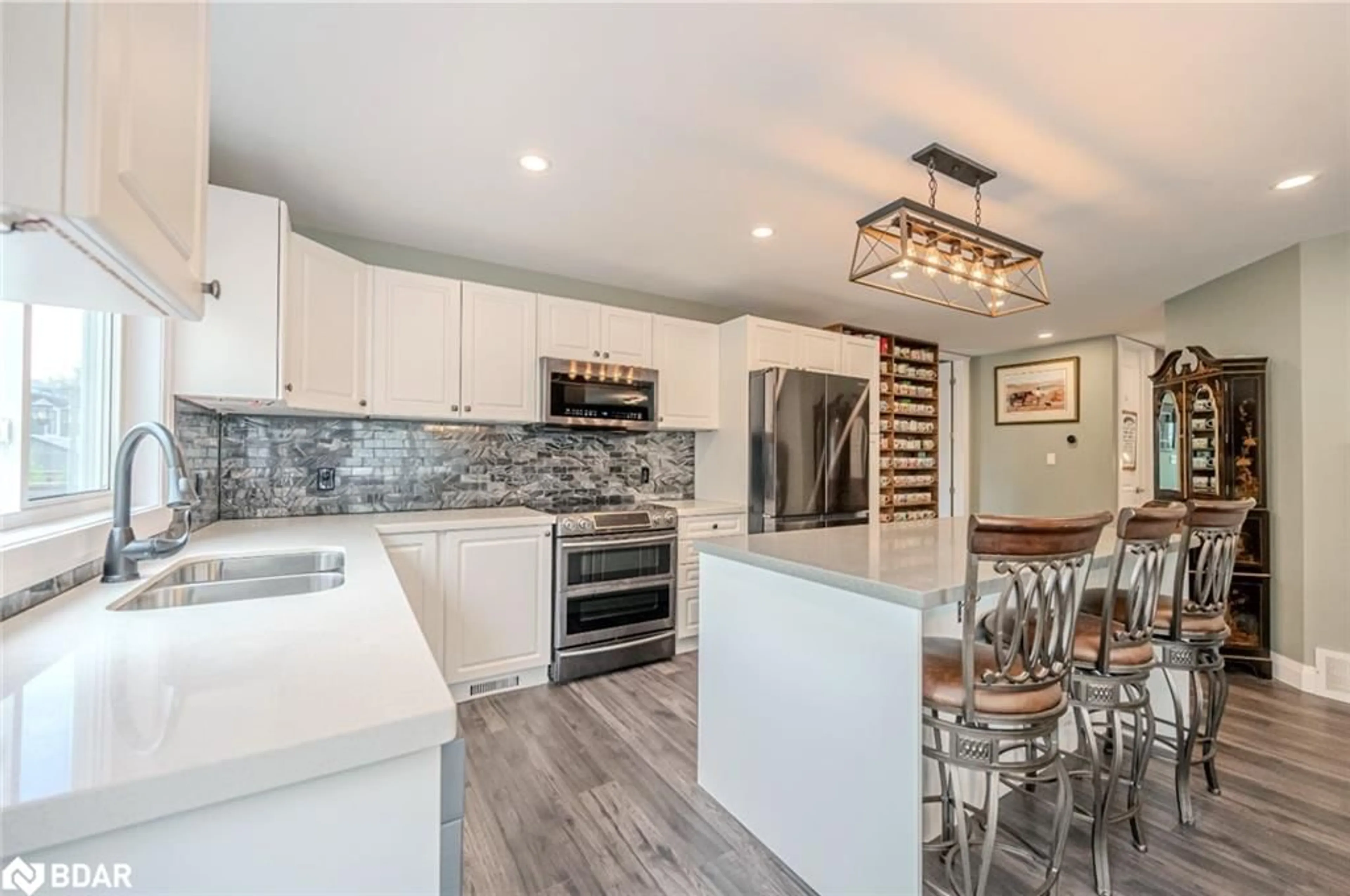 Open concept kitchen for 2638 Grand Tamarack Cres, Severn Ontario L3V 7A8