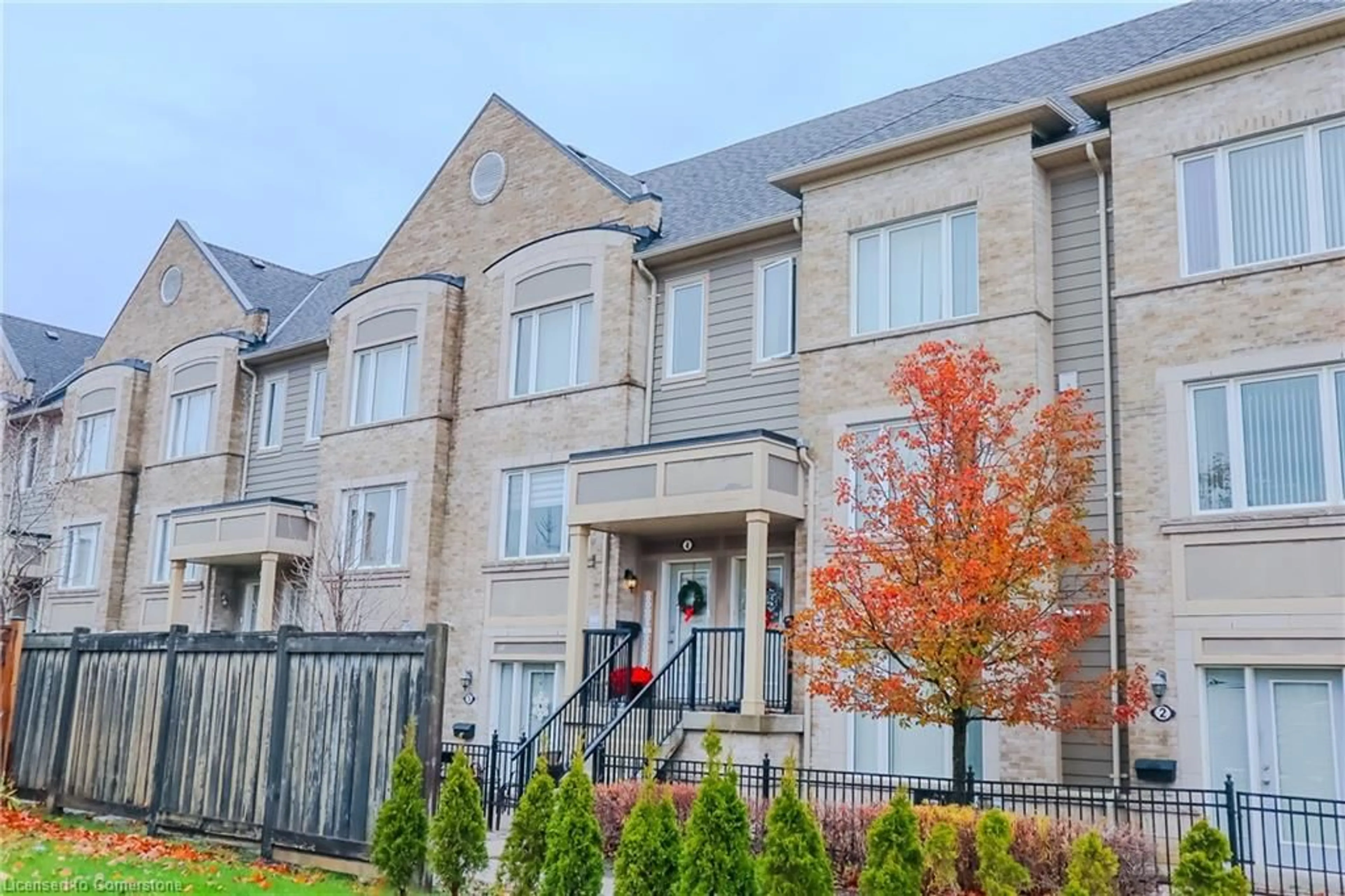 A pic from exterior of the house or condo, the fenced backyard for 60 Fairwood Cir #4, Brampton Ontario L6R 0Y6