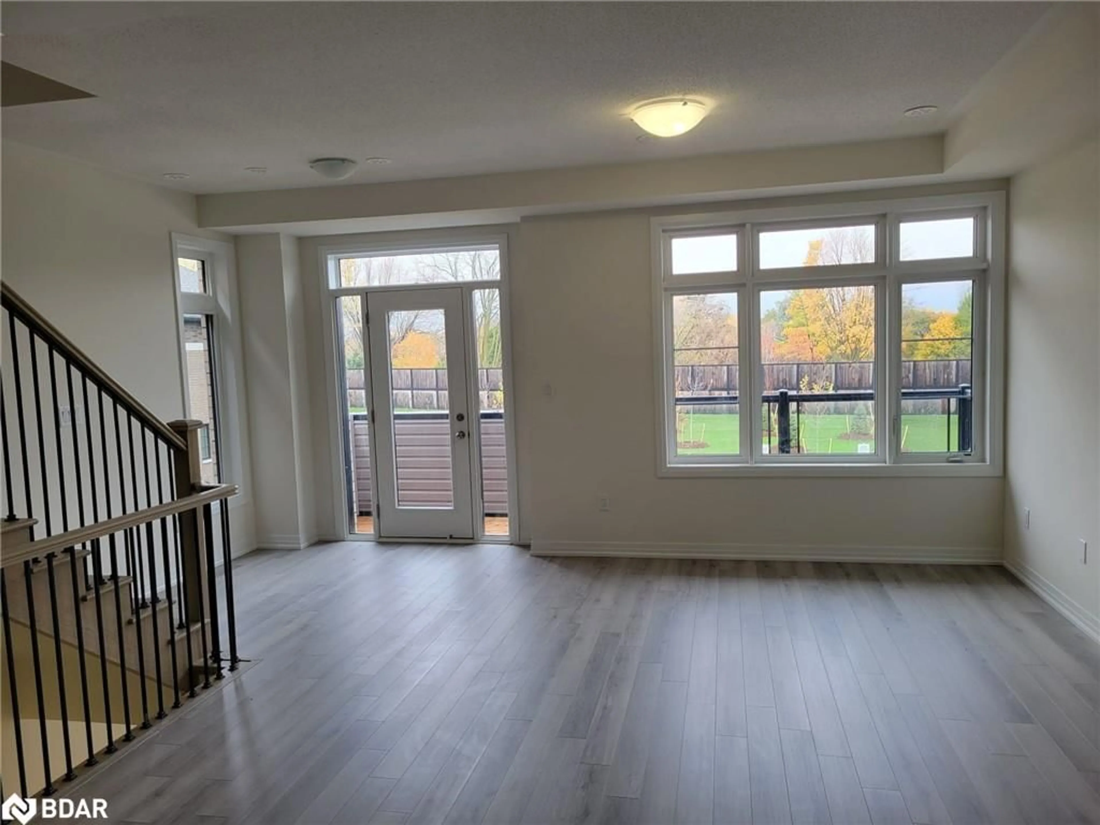 A pic of a room, wood floors for 21 Bluebird Lane, Barrie Ontario L9J 0M3