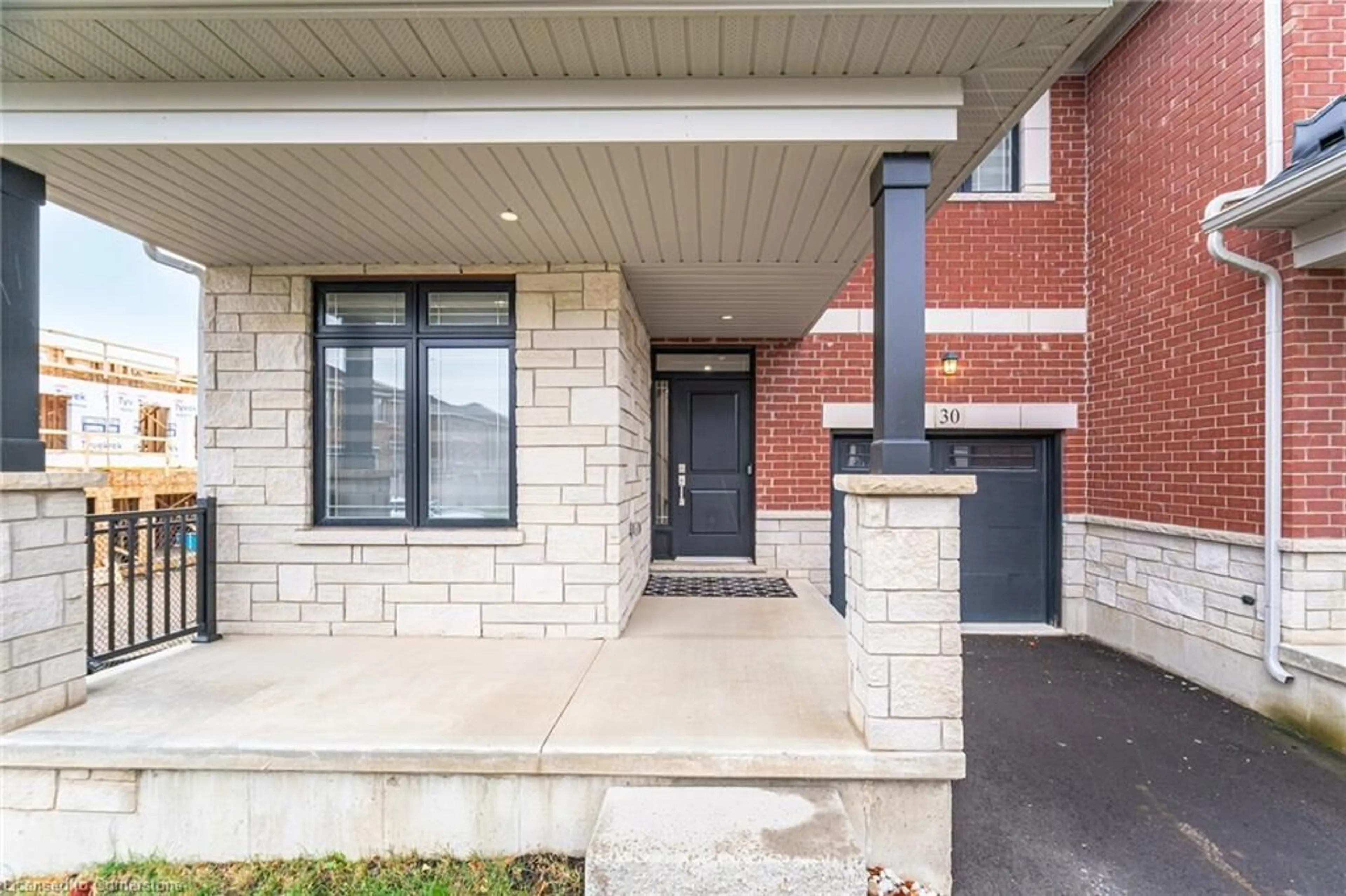 Home with brick exterior material for 30 Granite Ridge Trail, Waterdown Ontario L8B 1Y4