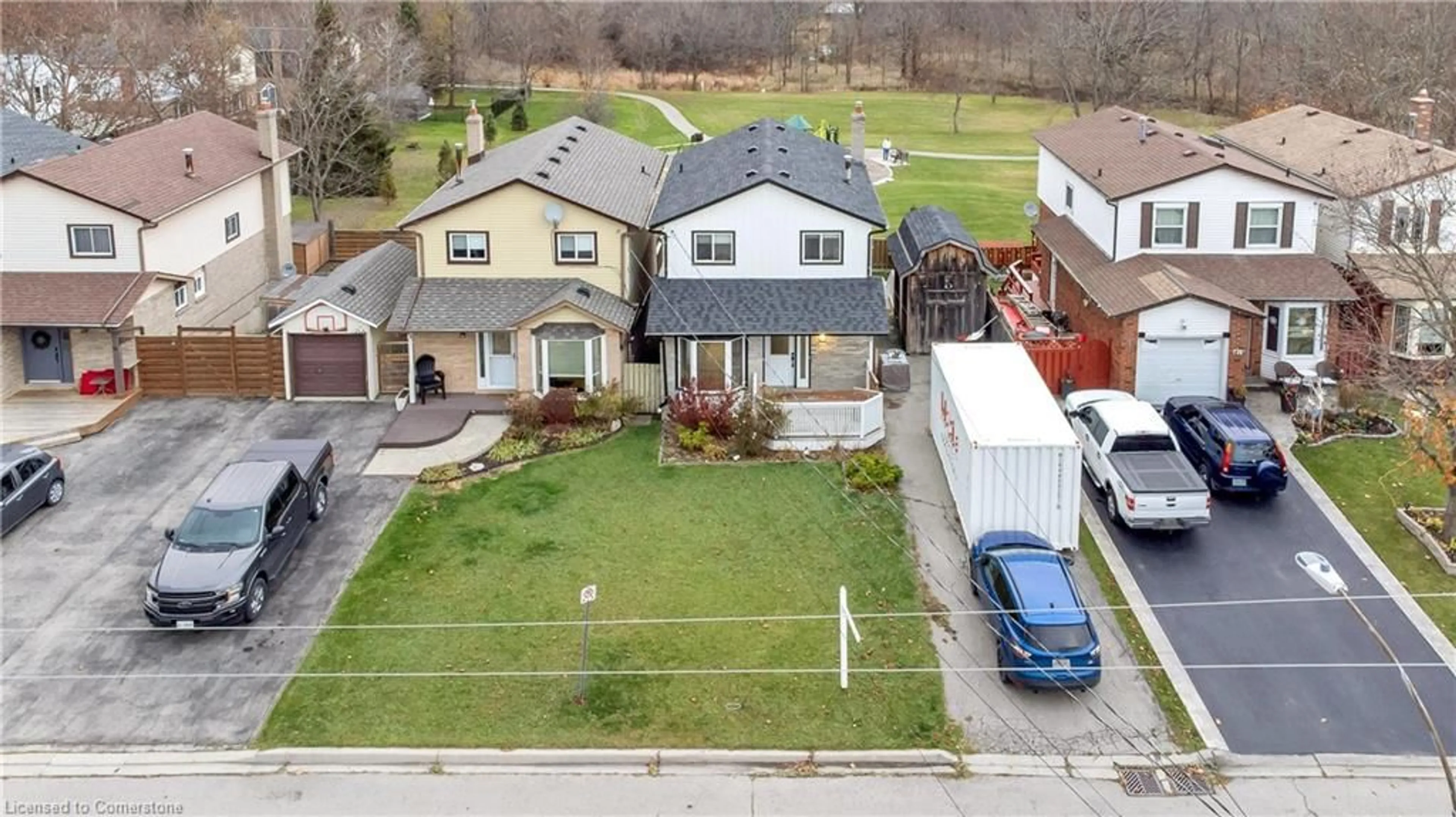 Frontside or backside of a home, the fenced backyard for 37 Burke Dr, Caledonia Ontario N3W 1C3