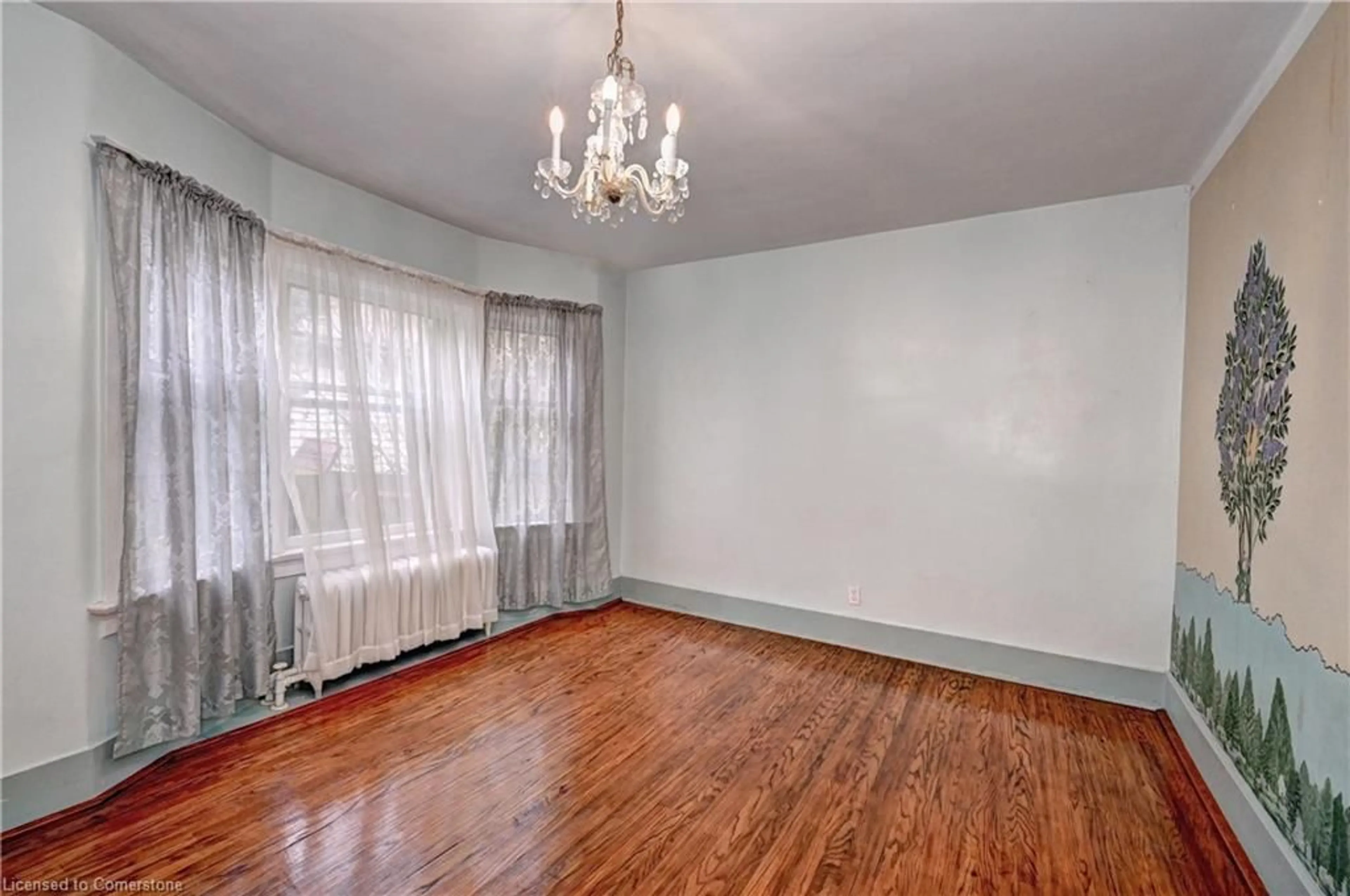 A pic of a room, wood floors for 362 Duke St, Kitchener Ontario N2H 3Y3