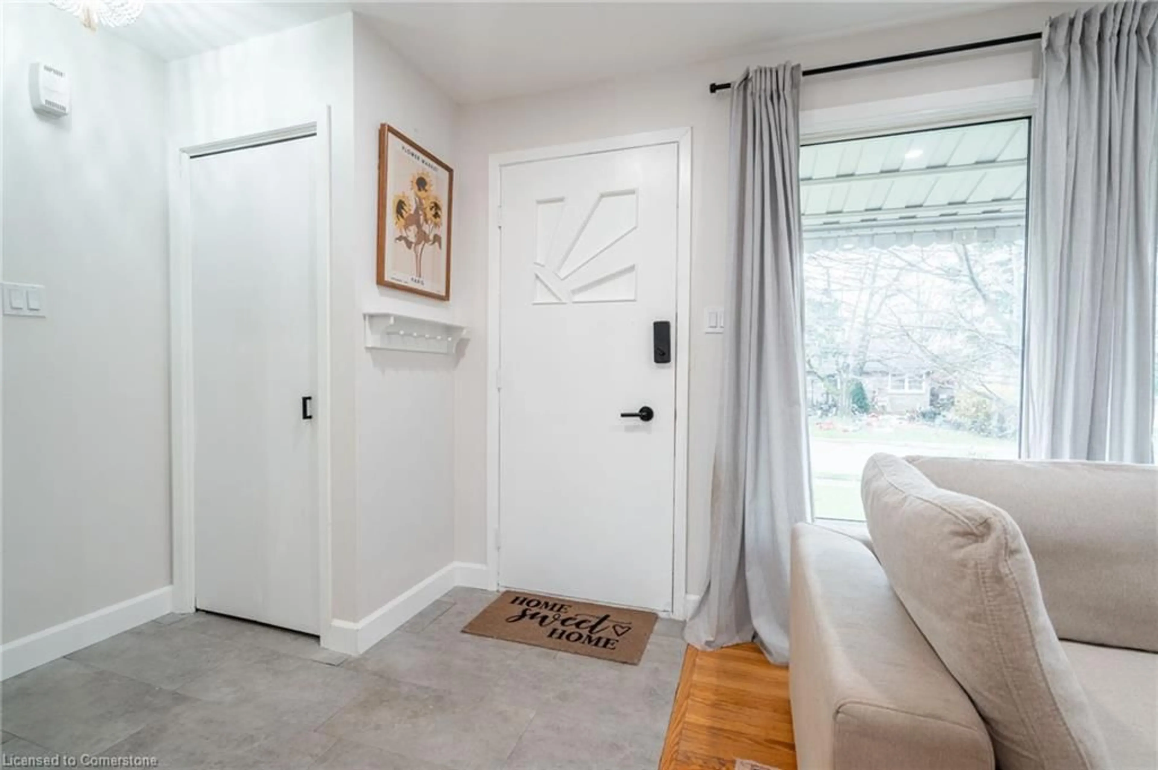 Indoor entryway, cement floor for 18 Warwick Rd, Stoney Creek Ontario L8E 1Y3