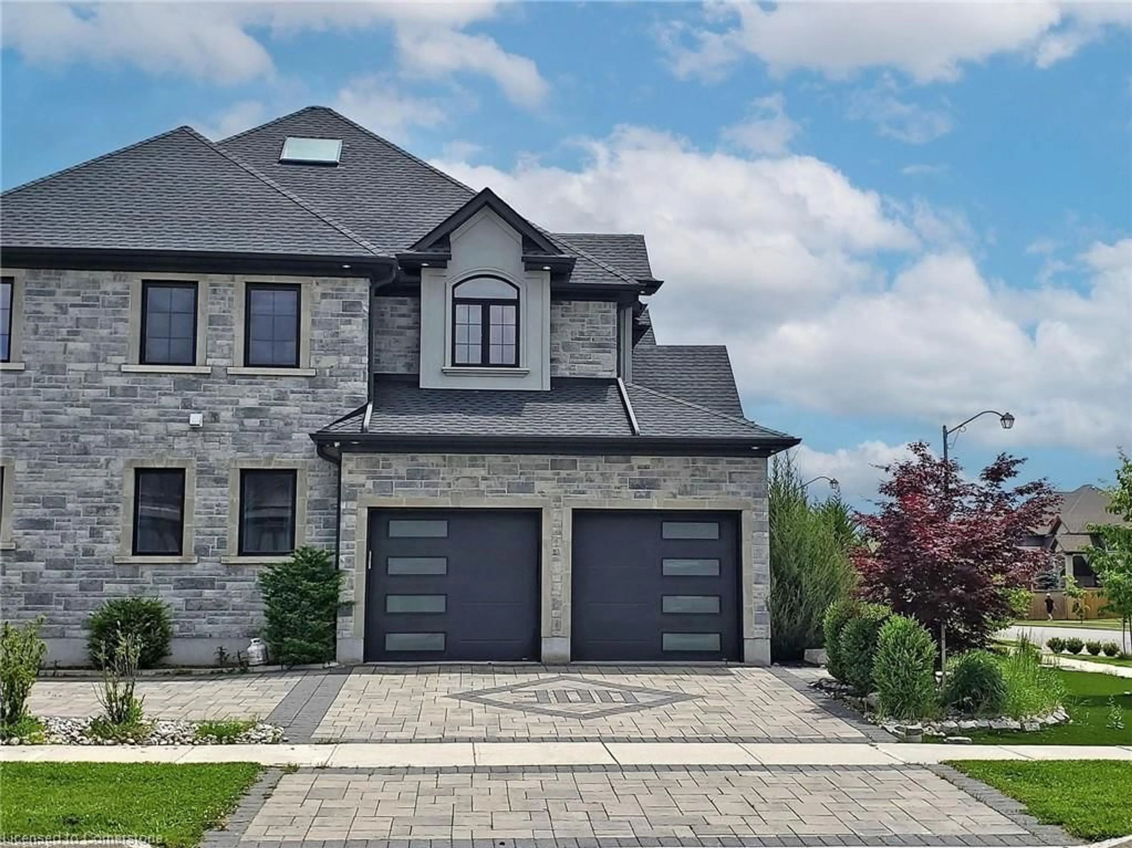 Home with brick exterior material for 300 Deerfoot Trail, Waterloo Ontario N2K 0B3