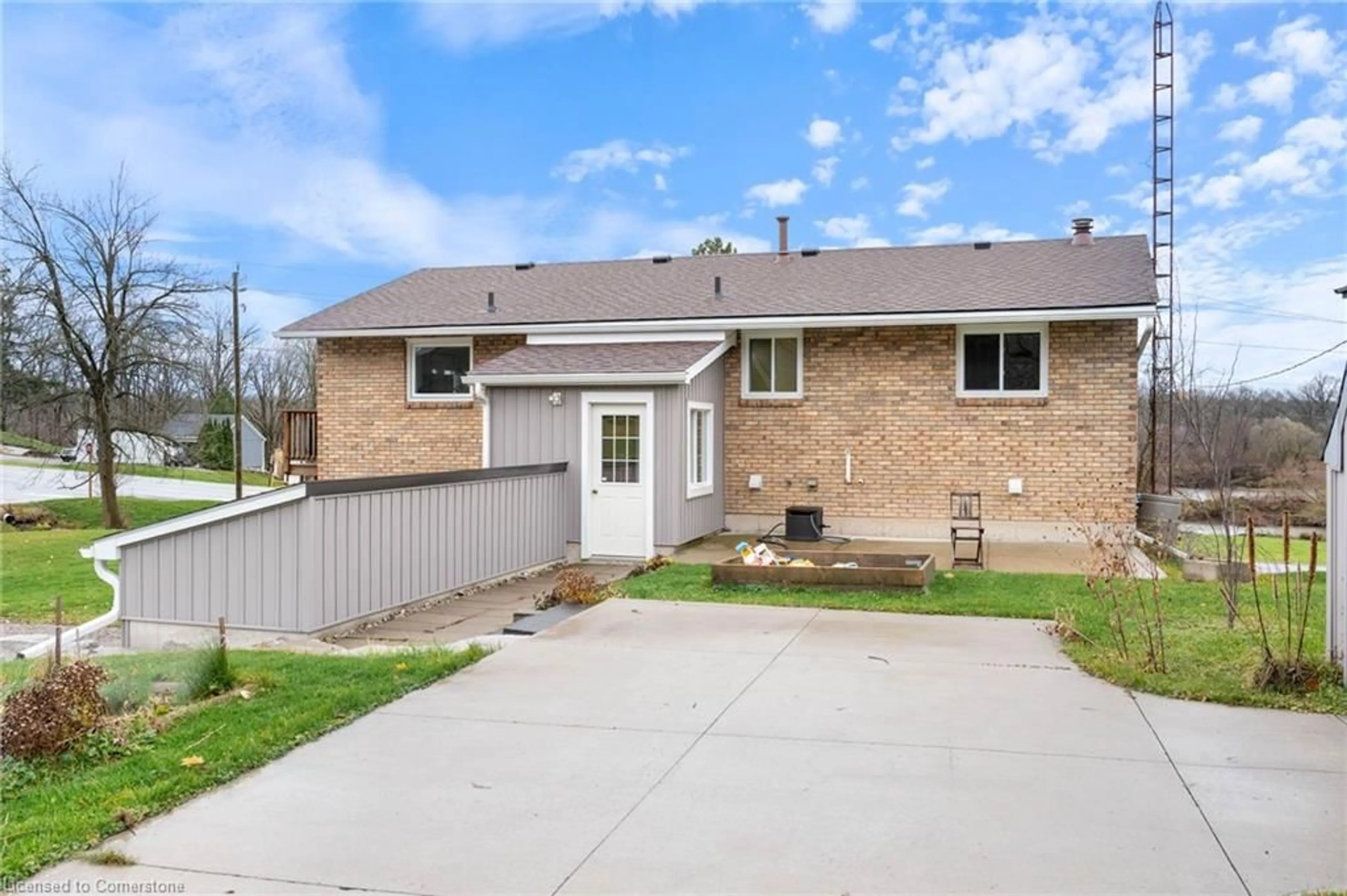 A pic from exterior of the house or condo, the fenced backyard for 65 Front St, York Ontario N0A 1R0