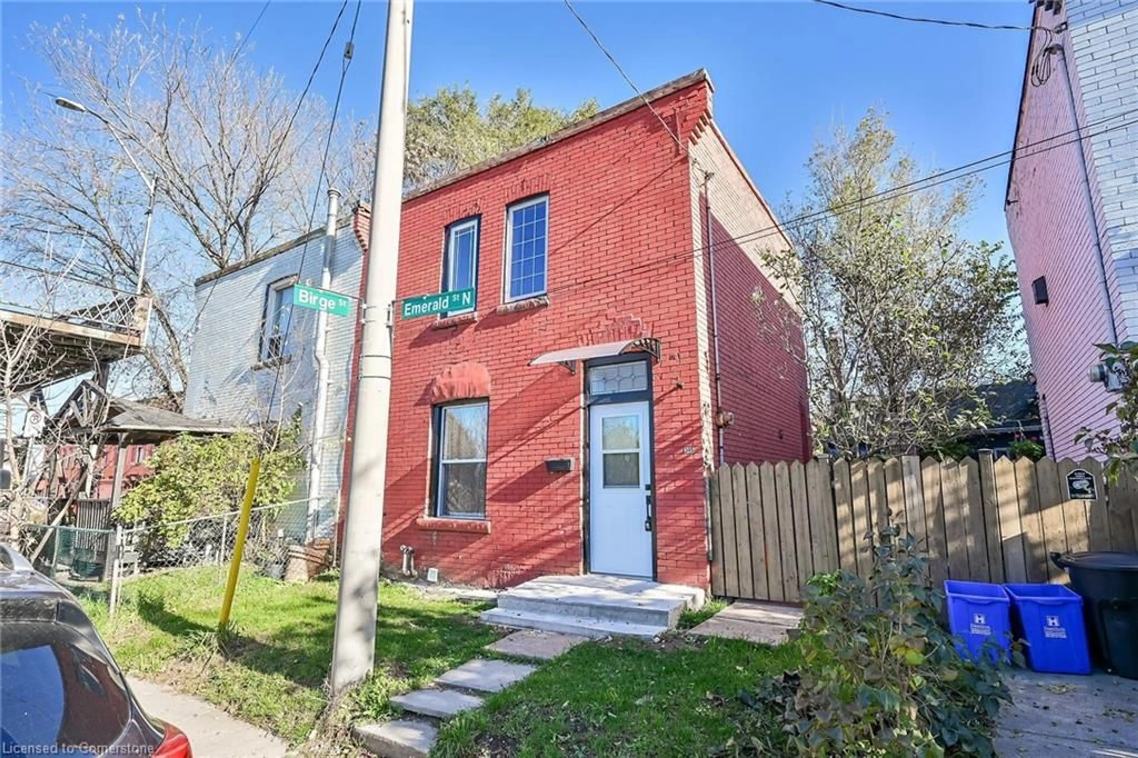 A pic from exterior of the house or condo, the fenced backyard for 346 Emerald St, Hamilton Ontario L8L 5L4