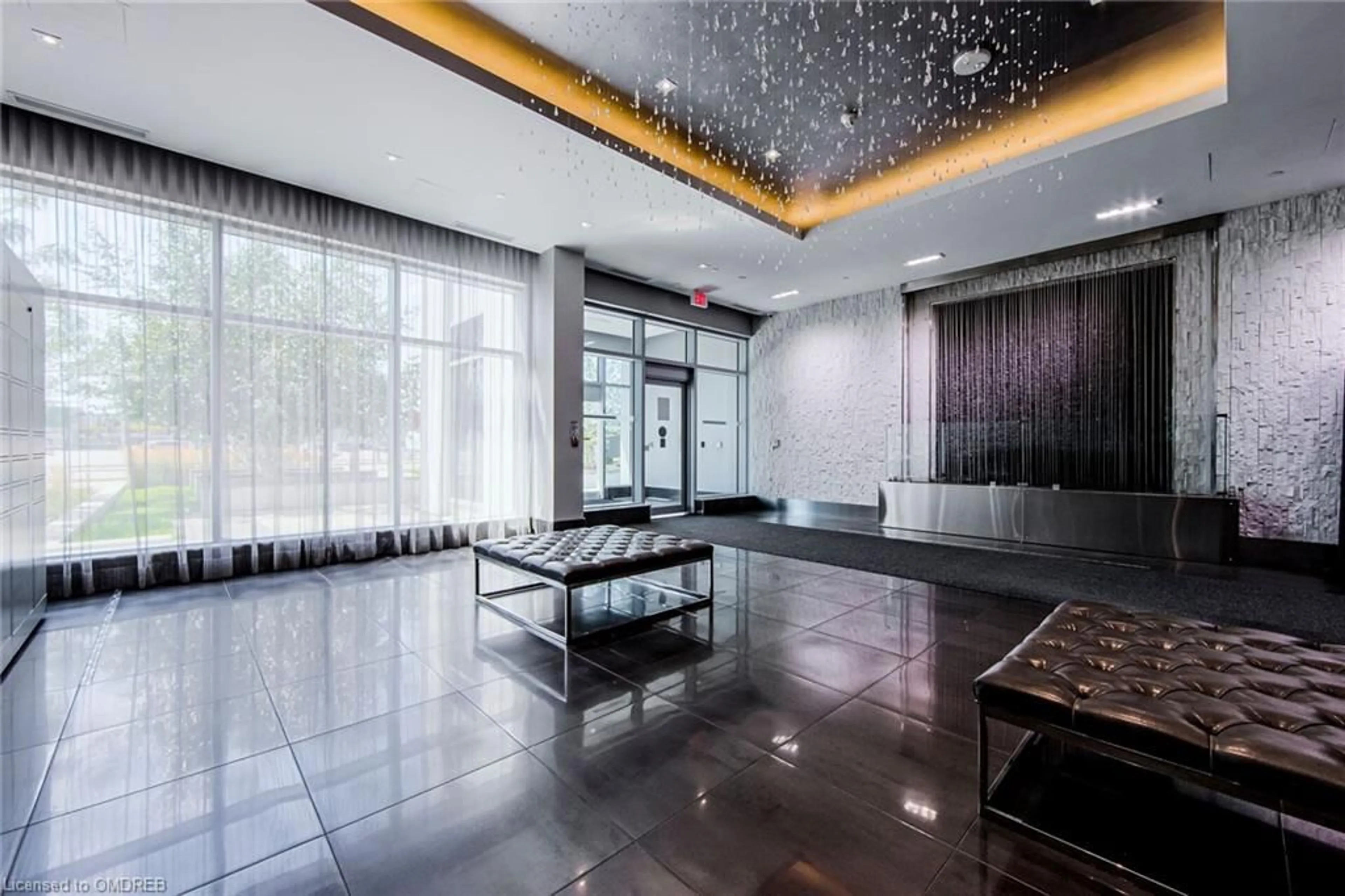 Indoor lobby, cement floor for 65 Speers Rd #209, Oakville Ontario L6K 0J1