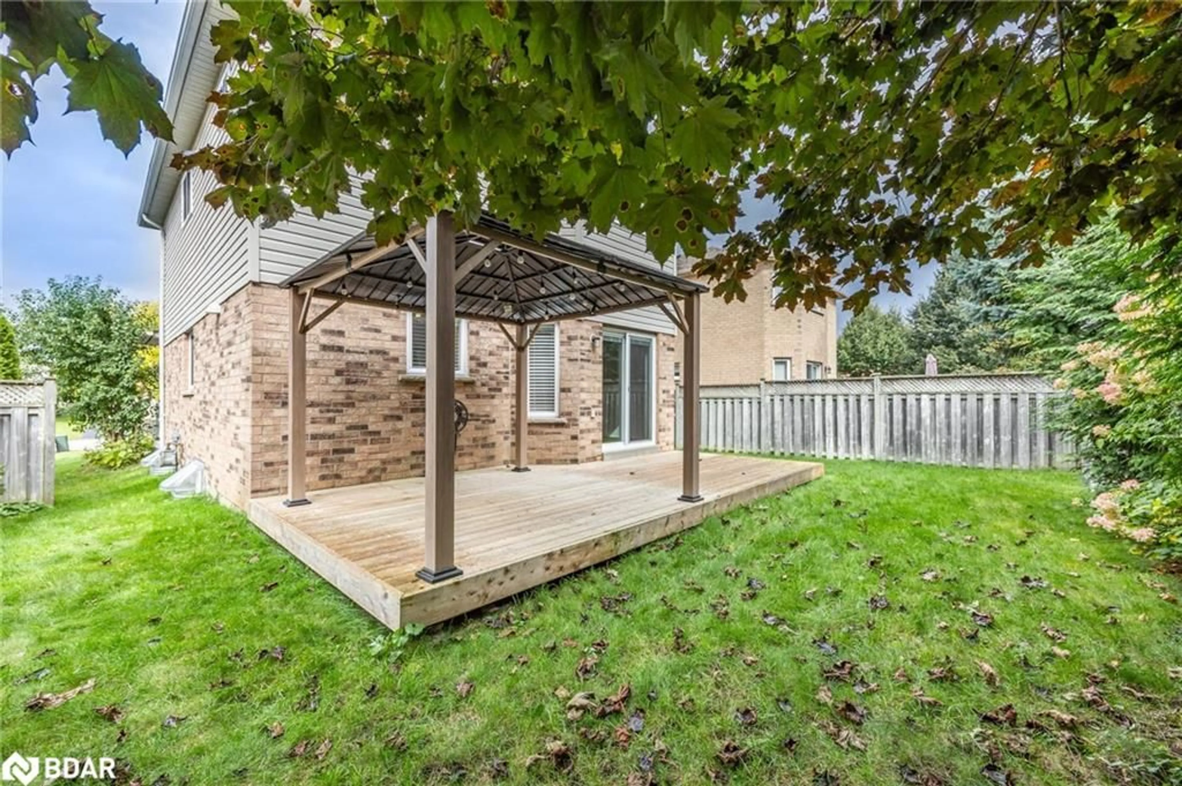 Patio, the fenced backyard for 21 Leslie Ave, Barrie Ontario L4N 9P1