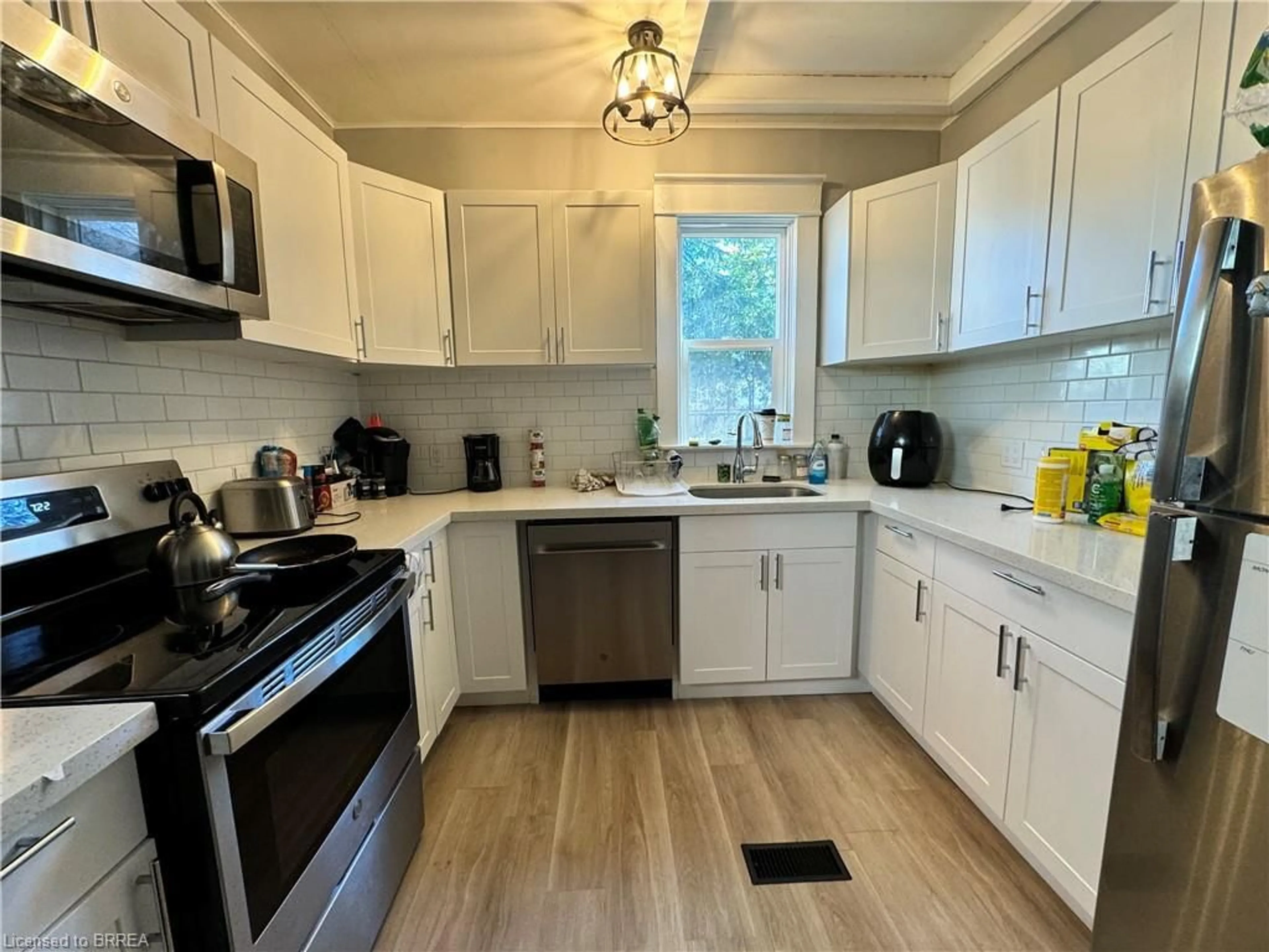 Standard kitchen, wood floors, cottage for 27 Alfred St, Brantford Ontario N3S 5E6