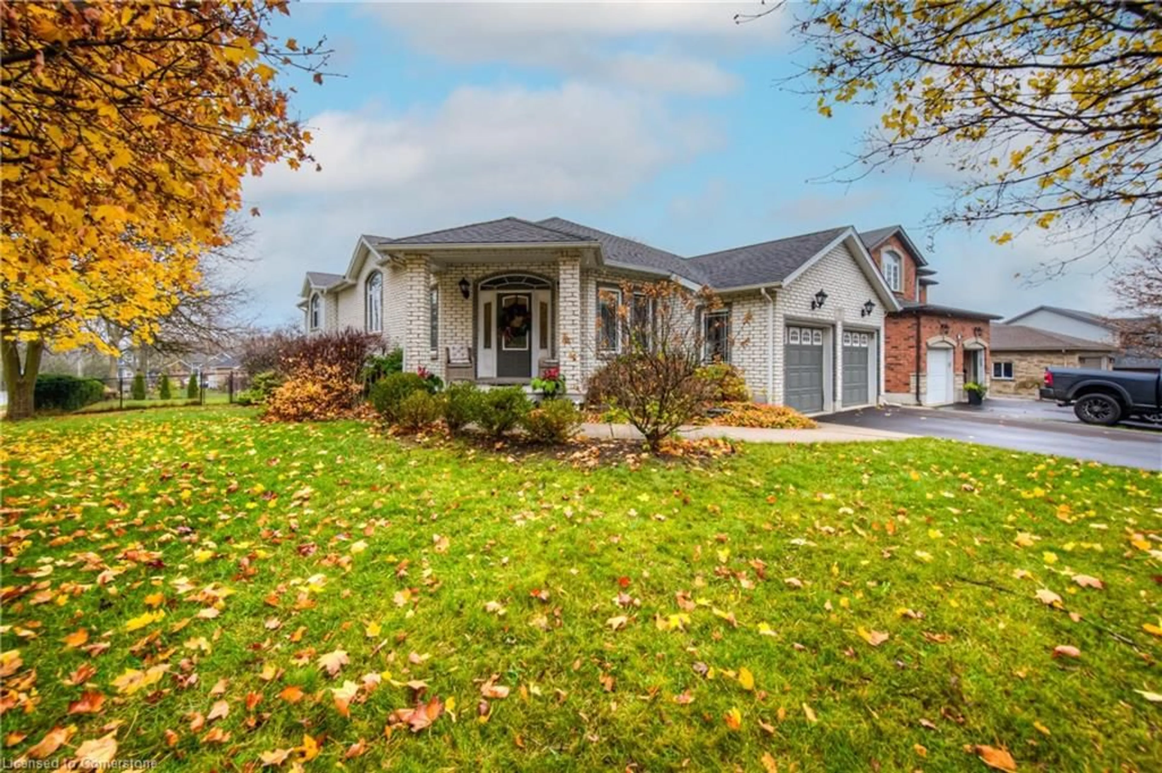 Frontside or backside of a home, the fenced backyard for 3 Berry Patch Lane, Cambridge Ontario N1S 5B3