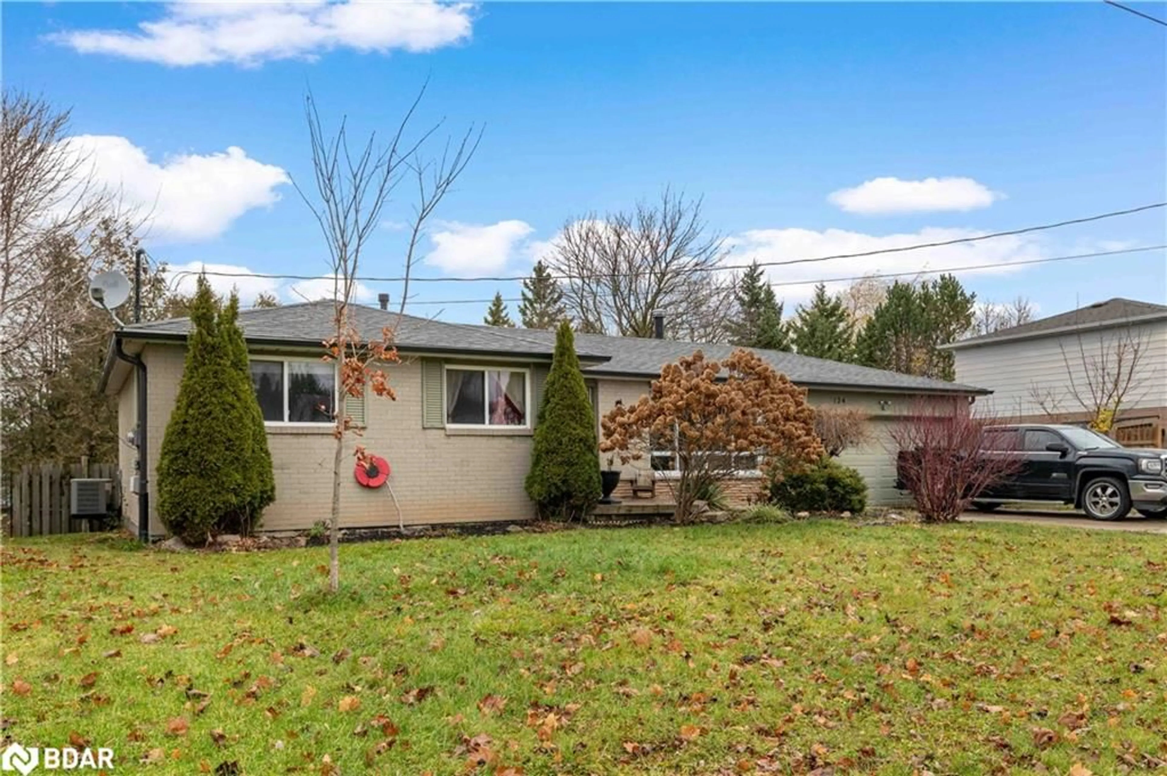 Frontside or backside of a home, the fenced backyard for 124 Muriel St, Shelburne Ontario L0N 1S1