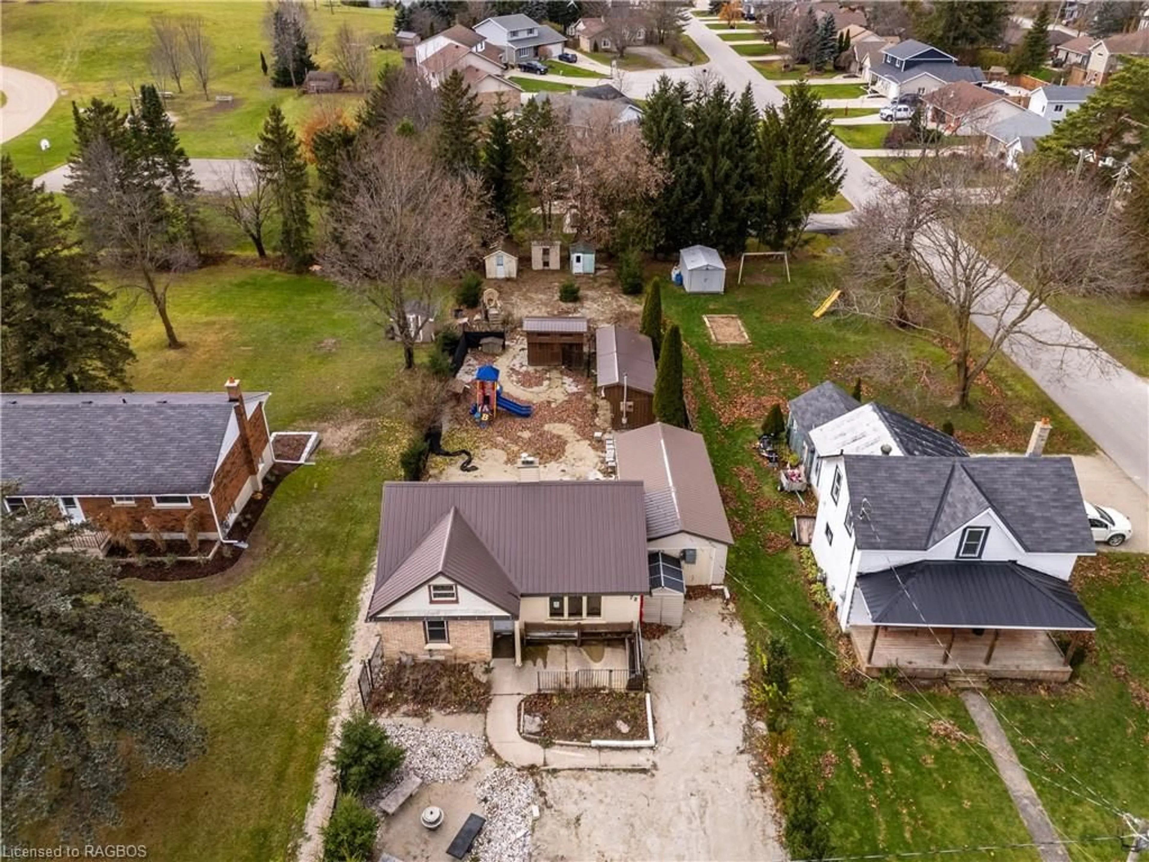 Frontside or backside of a home, the fenced backyard for 72 Hamilton St, Tara Ontario N0H 2N0