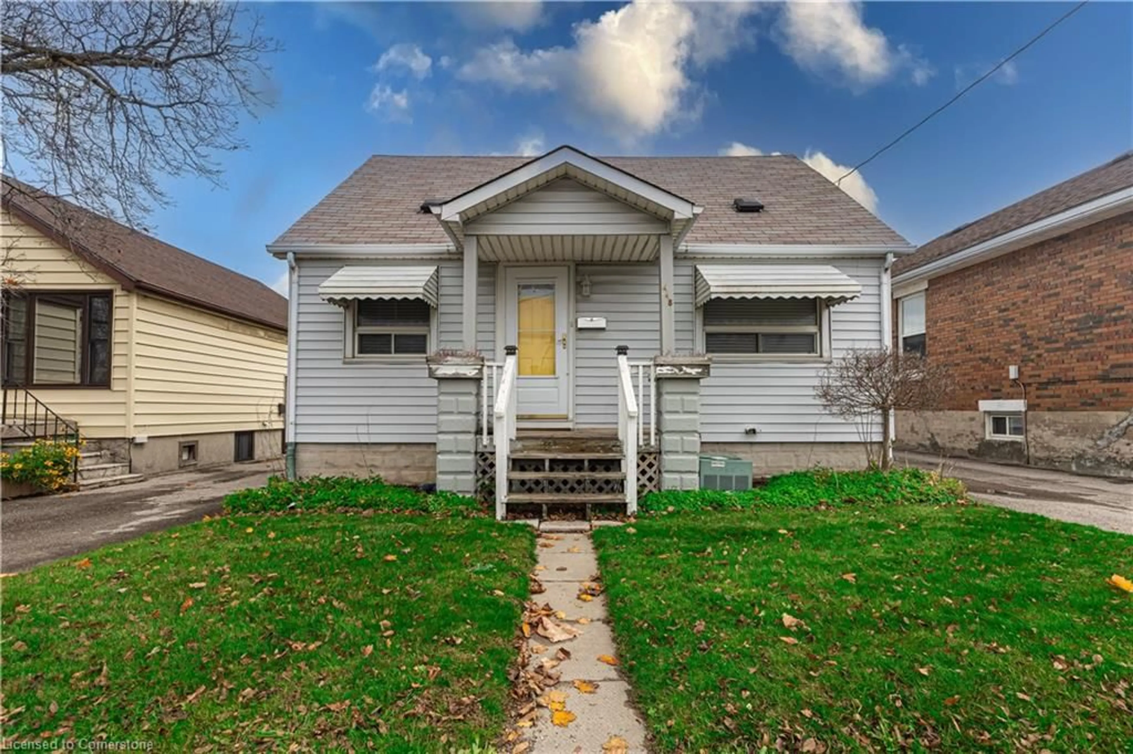 Frontside or backside of a home, the fenced backyard for 448 Third St, London Ontario N5W 4W6